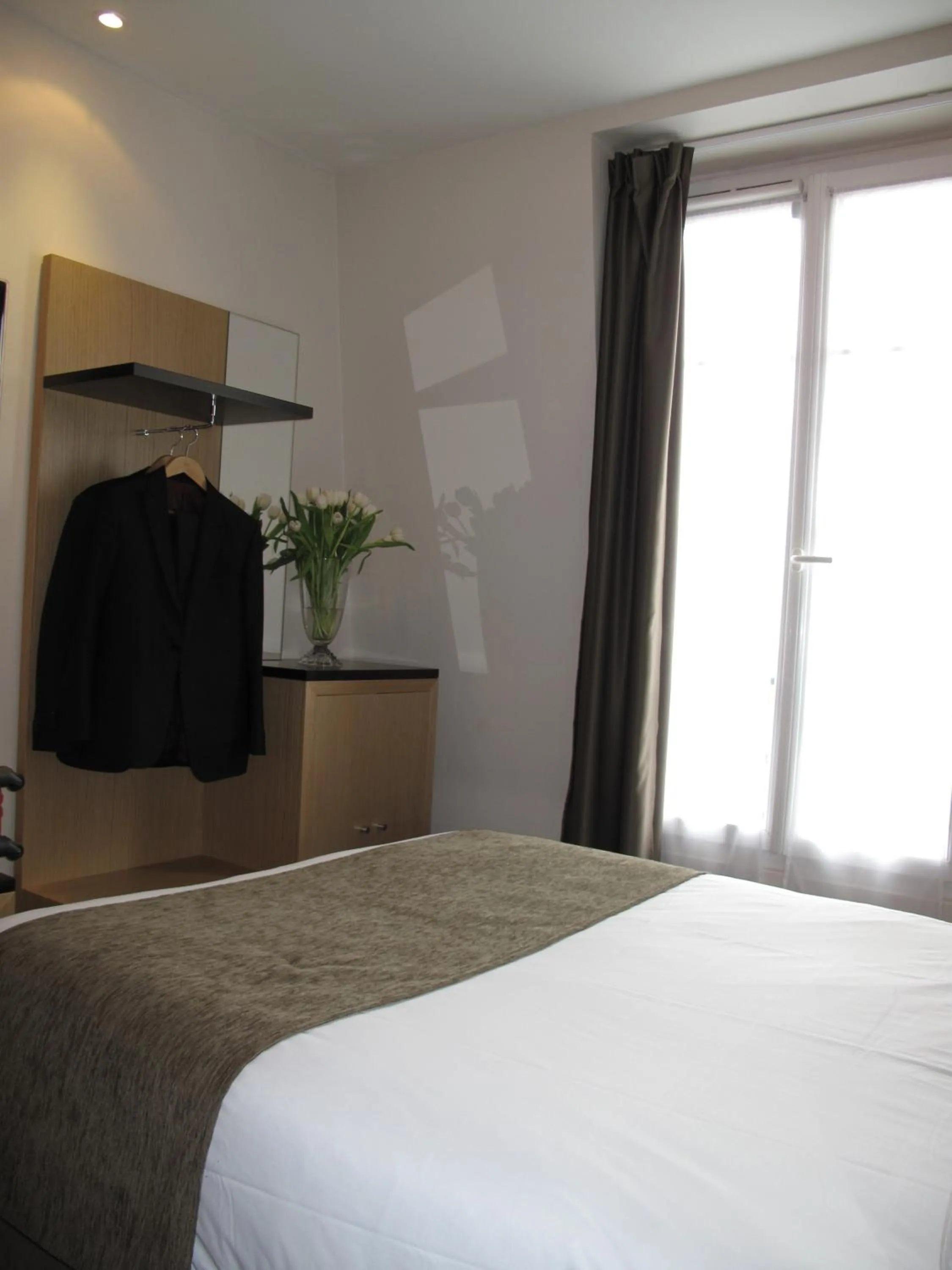 Bed in Source Hôtel