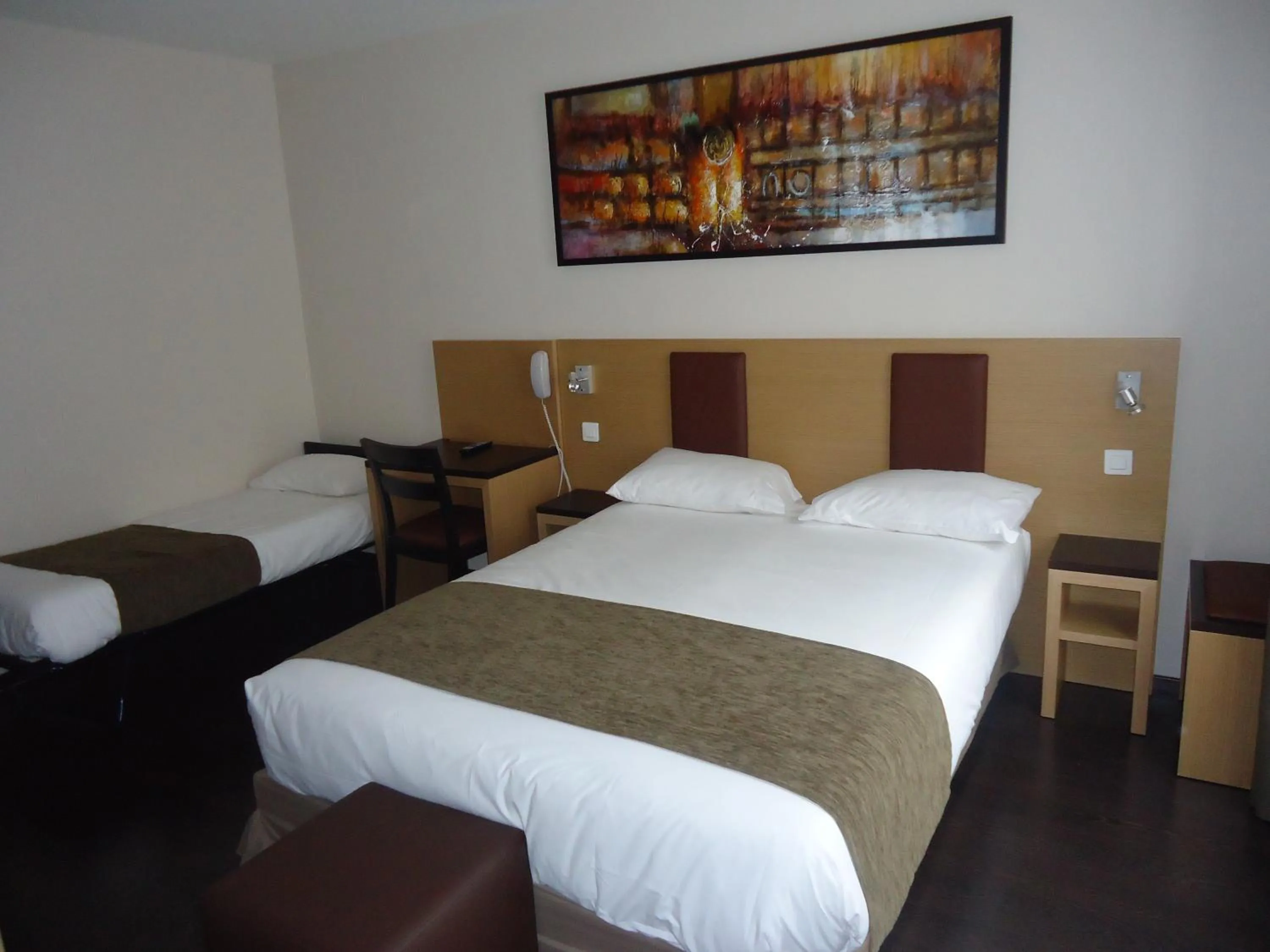 Bed in Source Hôtel