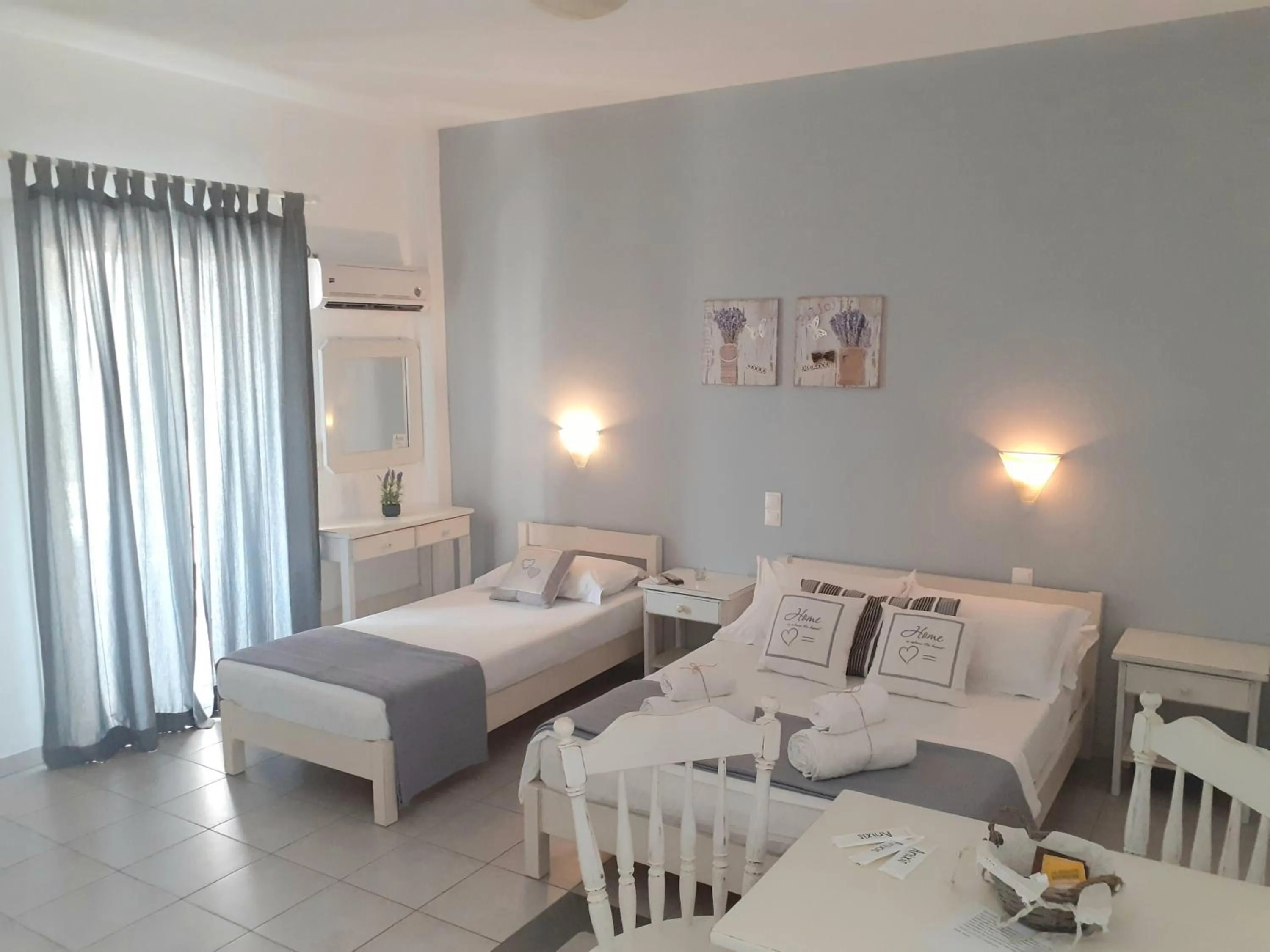 Bed in Anixis Studios Aliki Paros