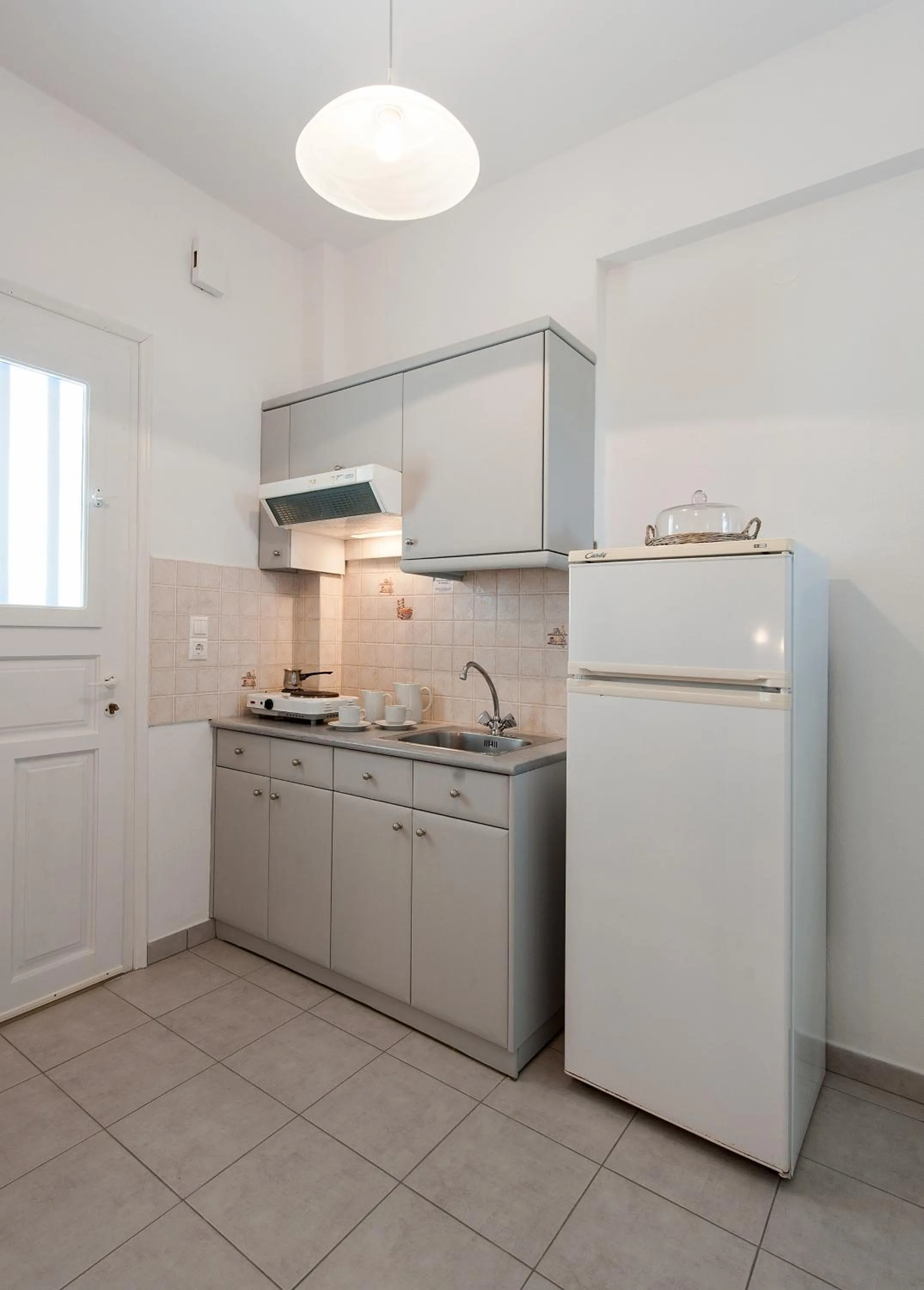 Kitchen or kitchenette in Anixis Studios Aliki Paros