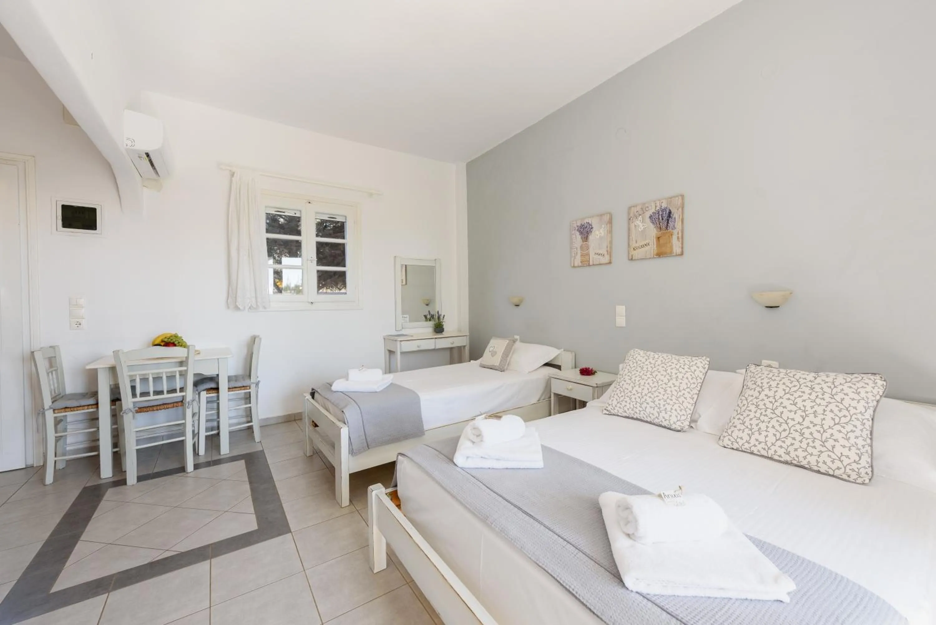 Bed in Anixis Studios Aliki Paros