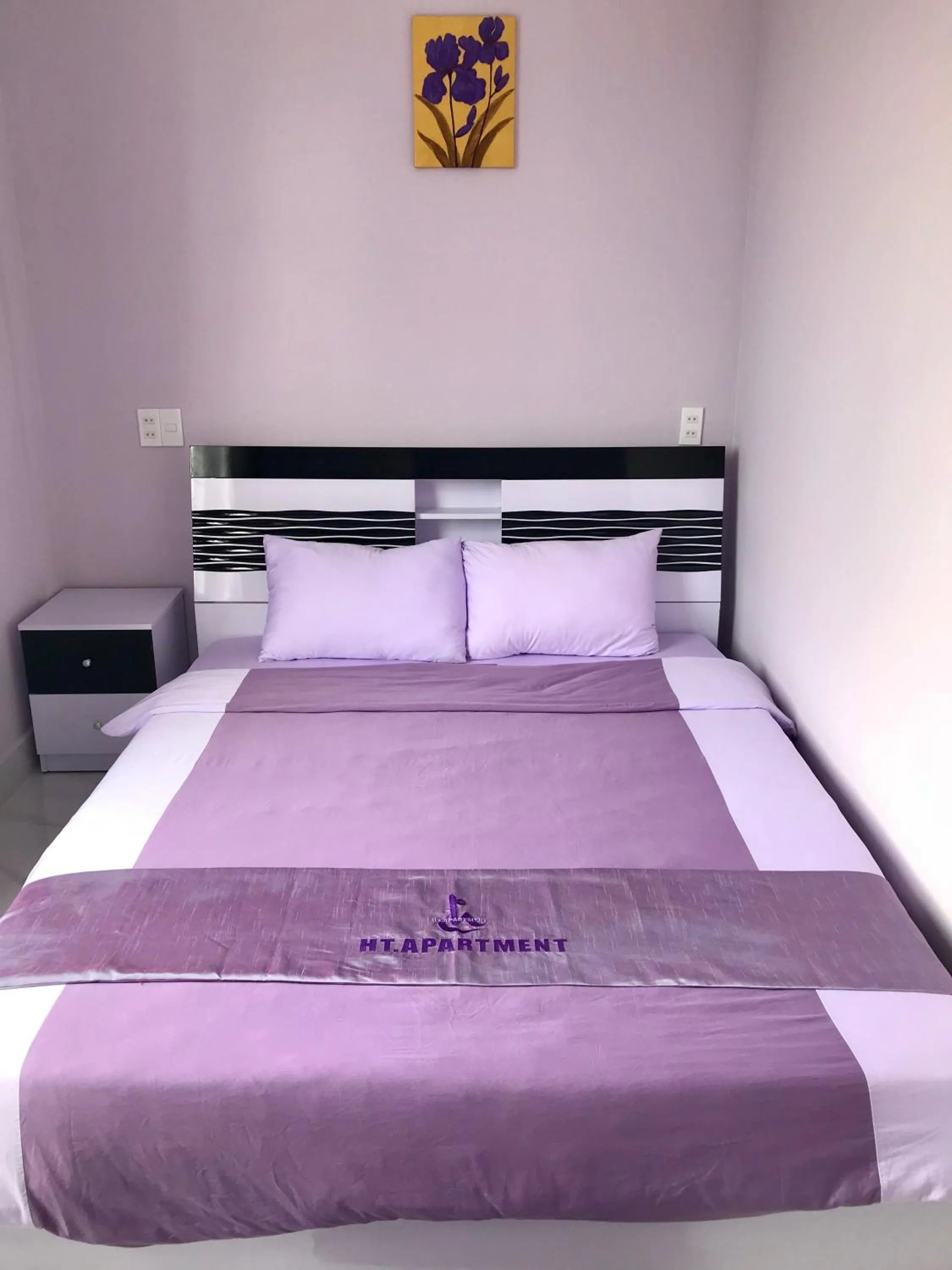 Bed in HT Hotel Apartment