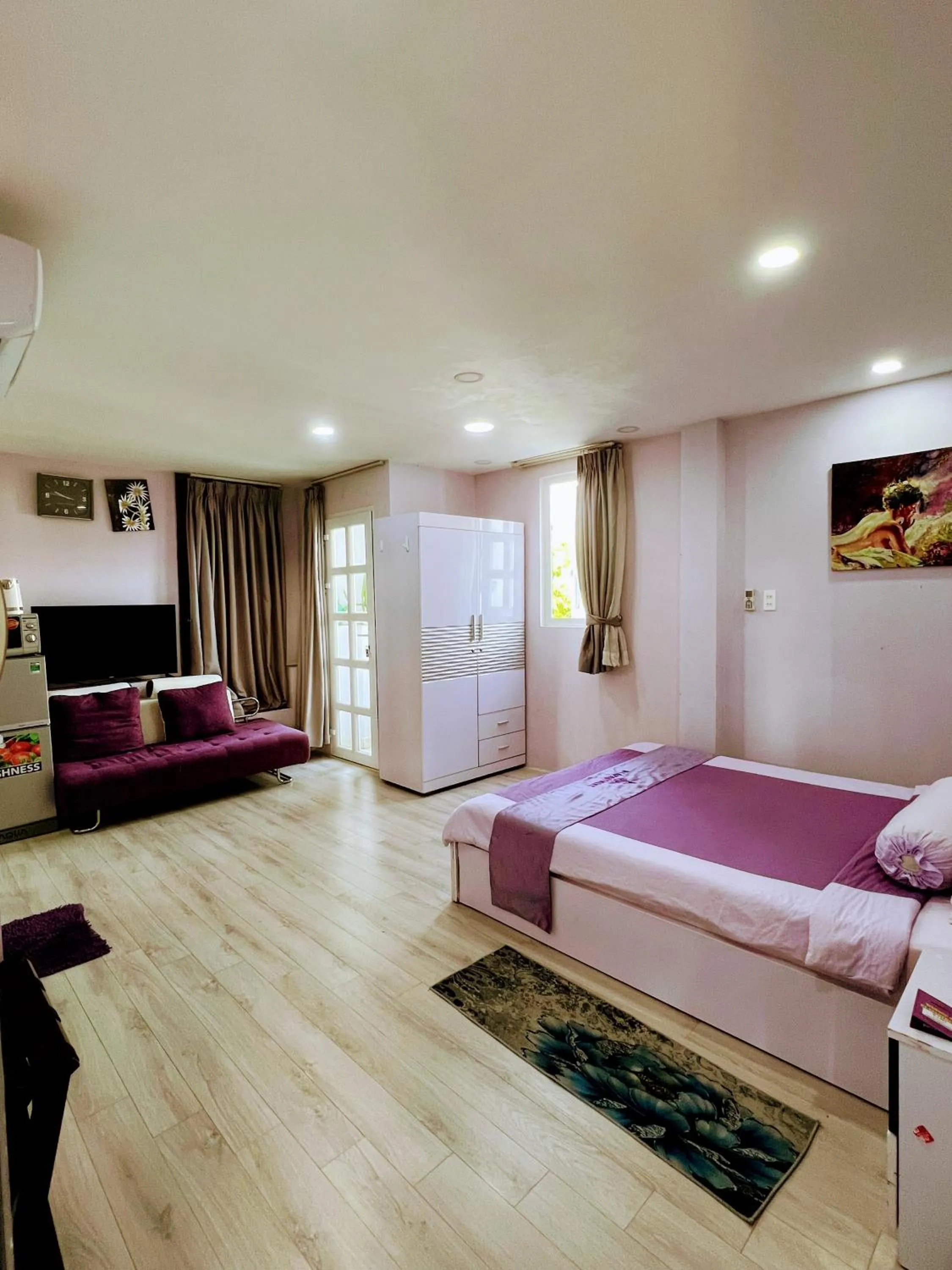 Photo of the whole room, Bed in HT Hotel Apartment