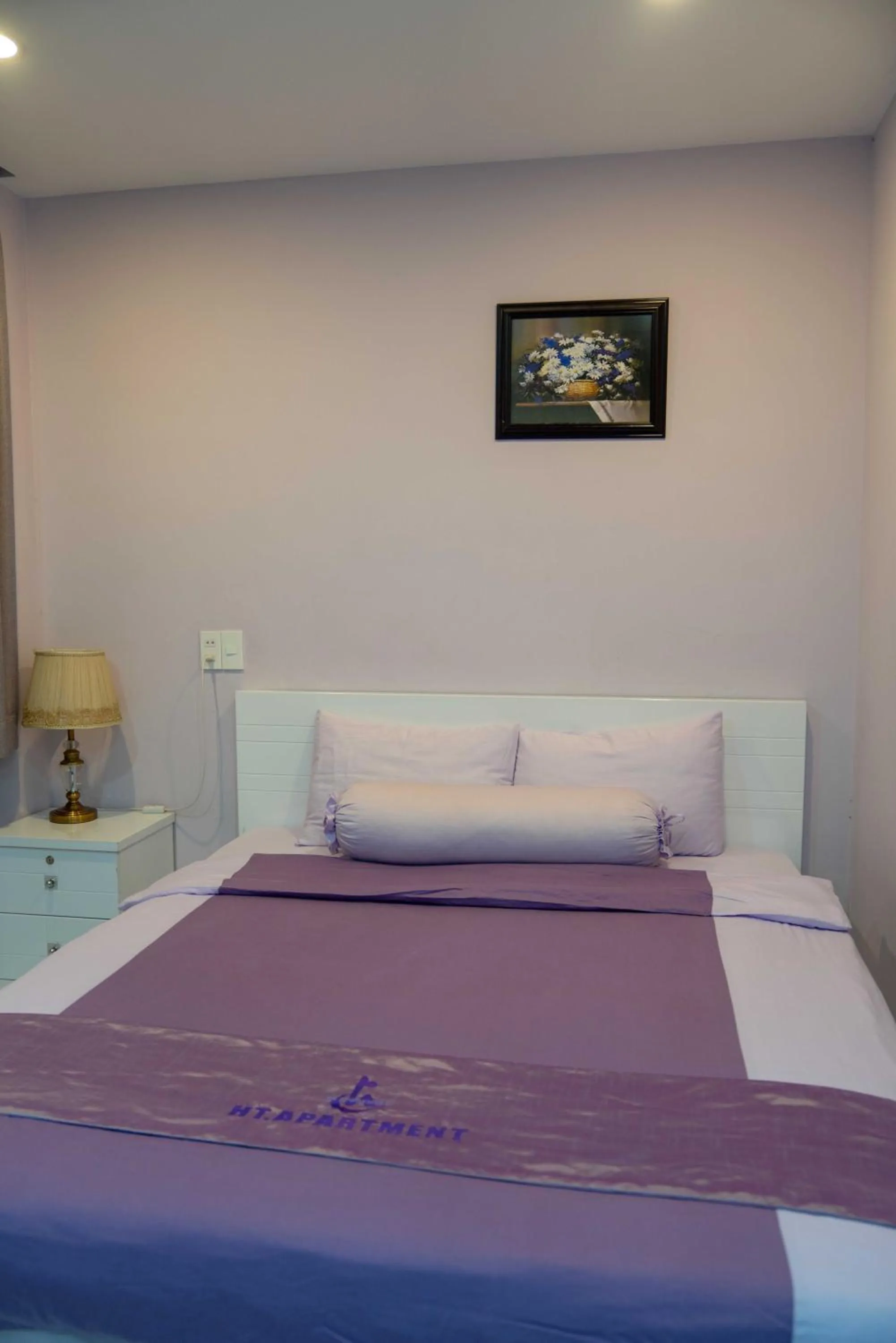 Bed in HT Hotel Apartment