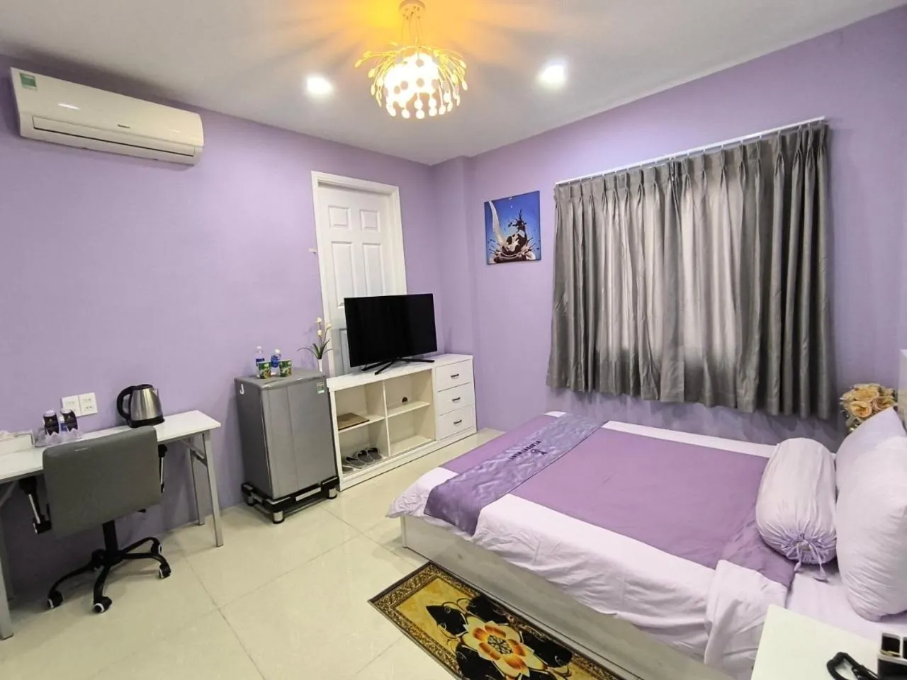 Bed in HT Hotel Apartment