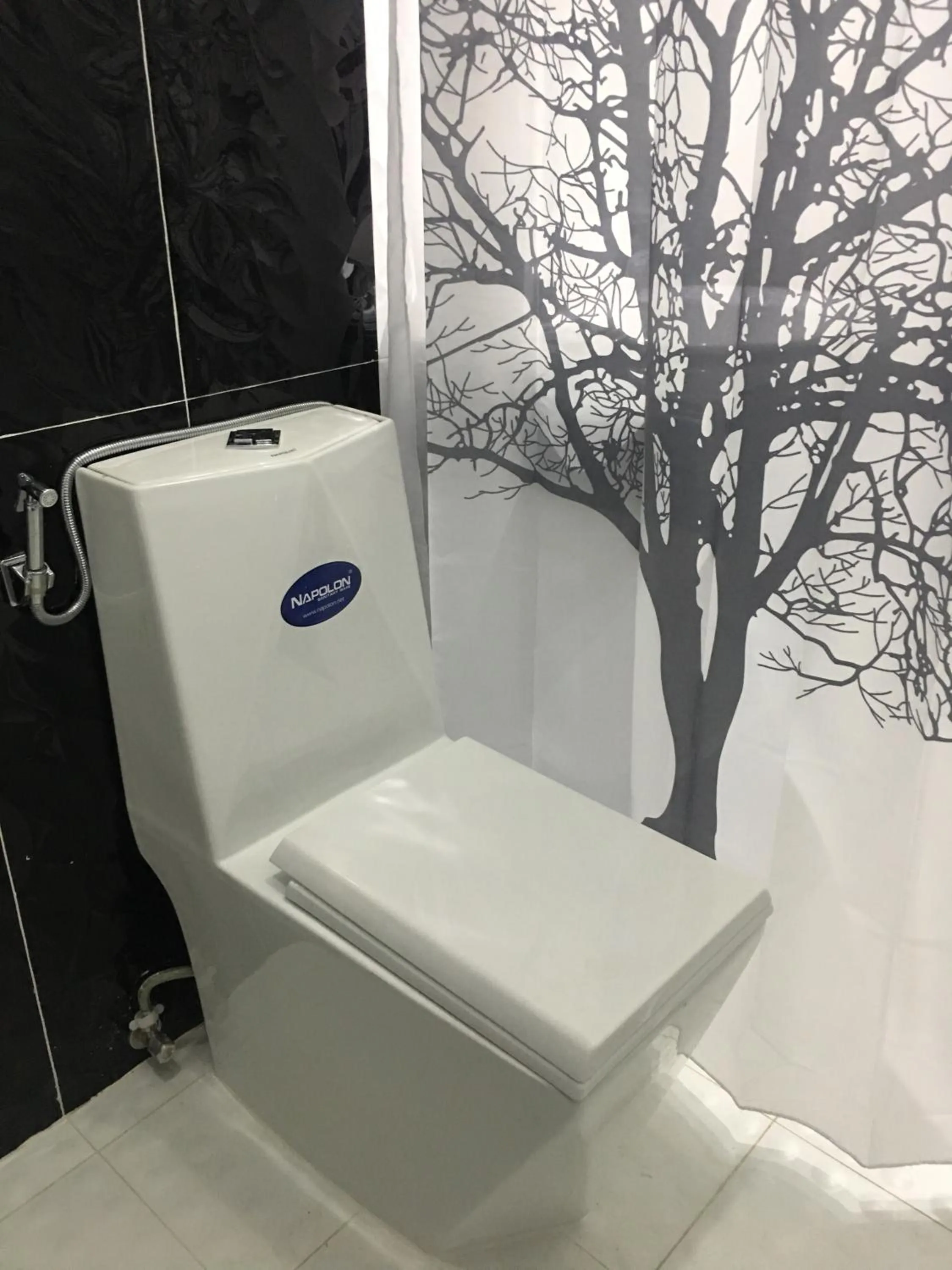 Toilet in HT Hotel Apartment