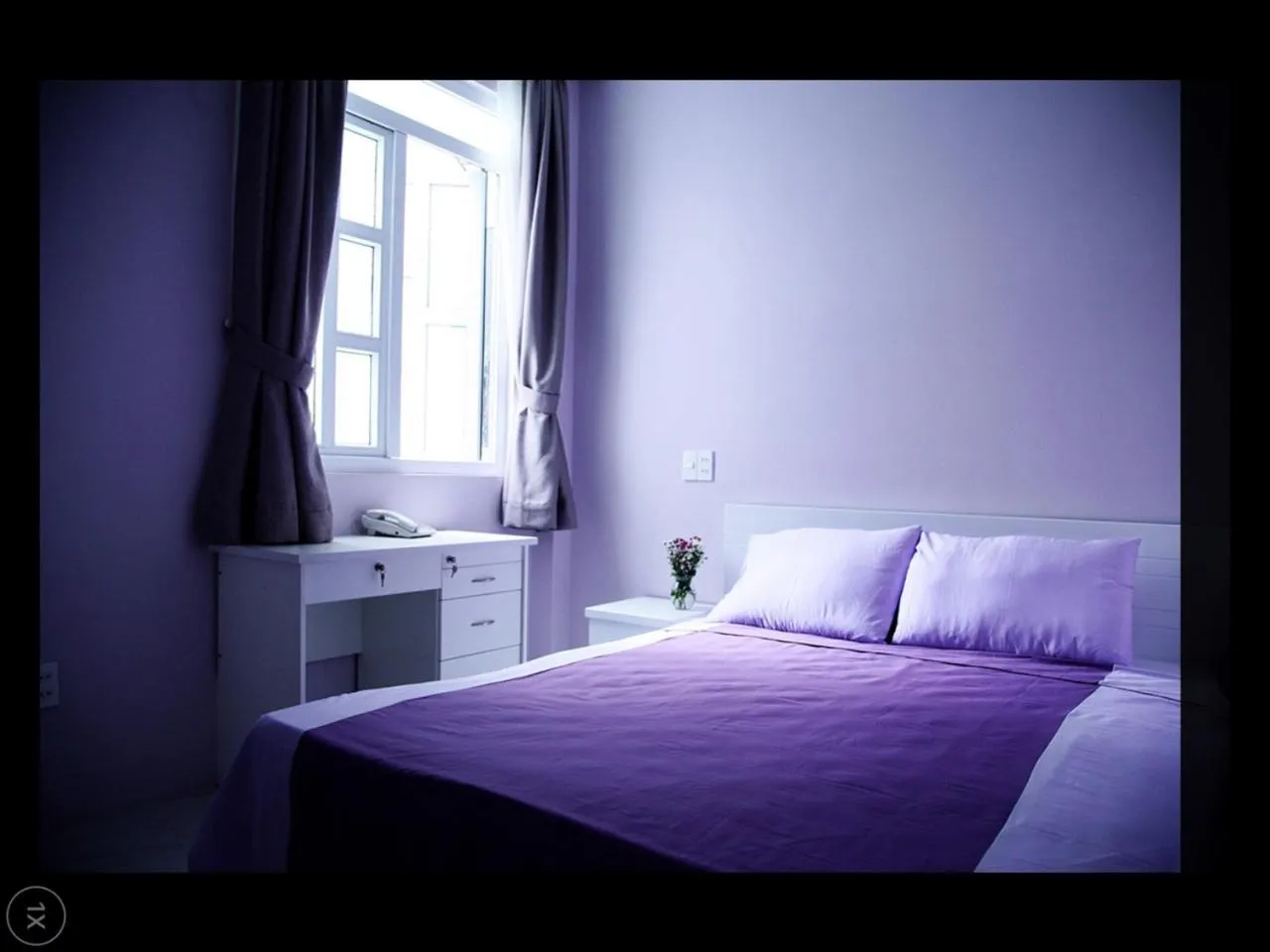 Bed in HT Hotel Apartment