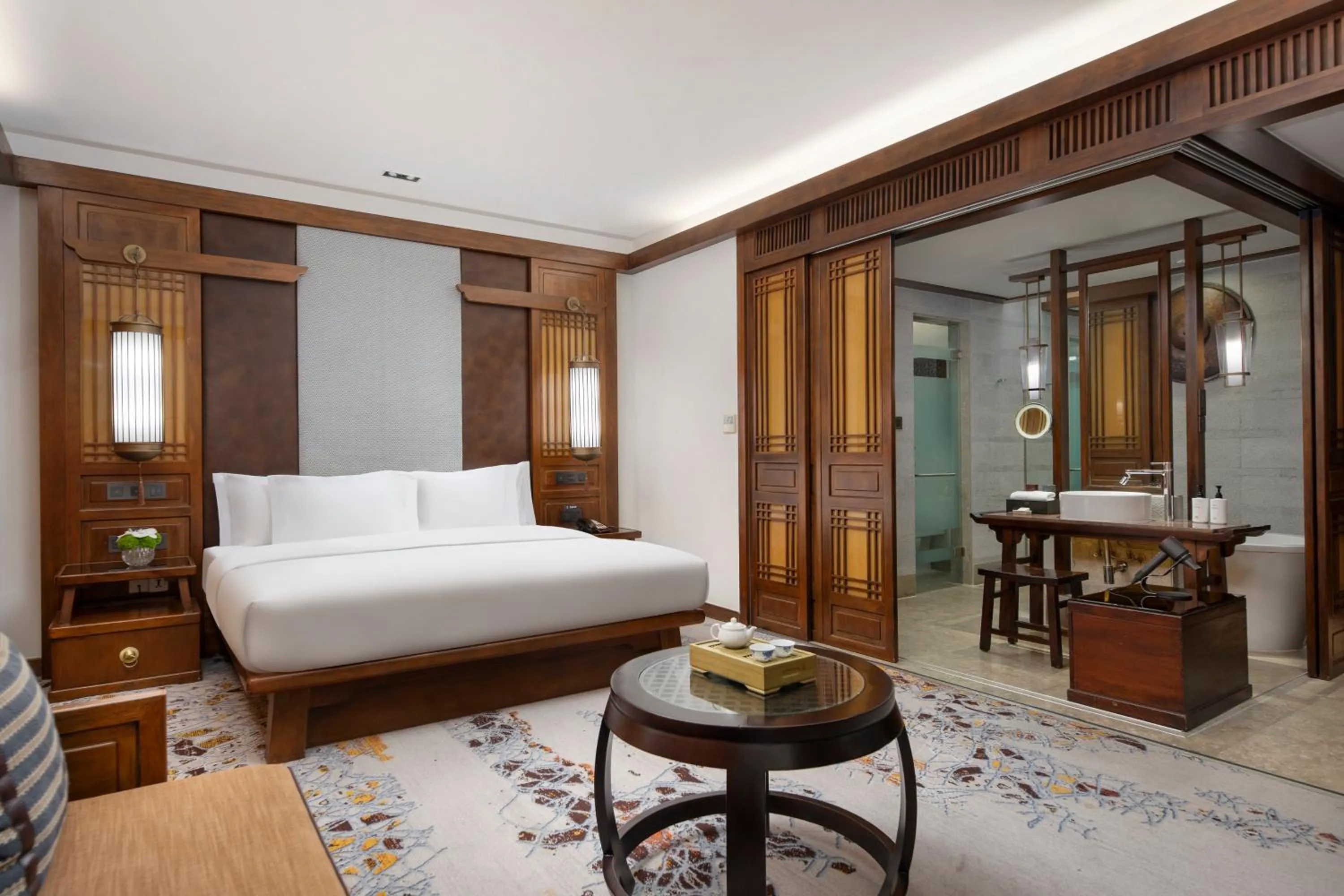 Photo of the whole room, Bed in InterContinental Lijiang Ancient Town Resort by IHG