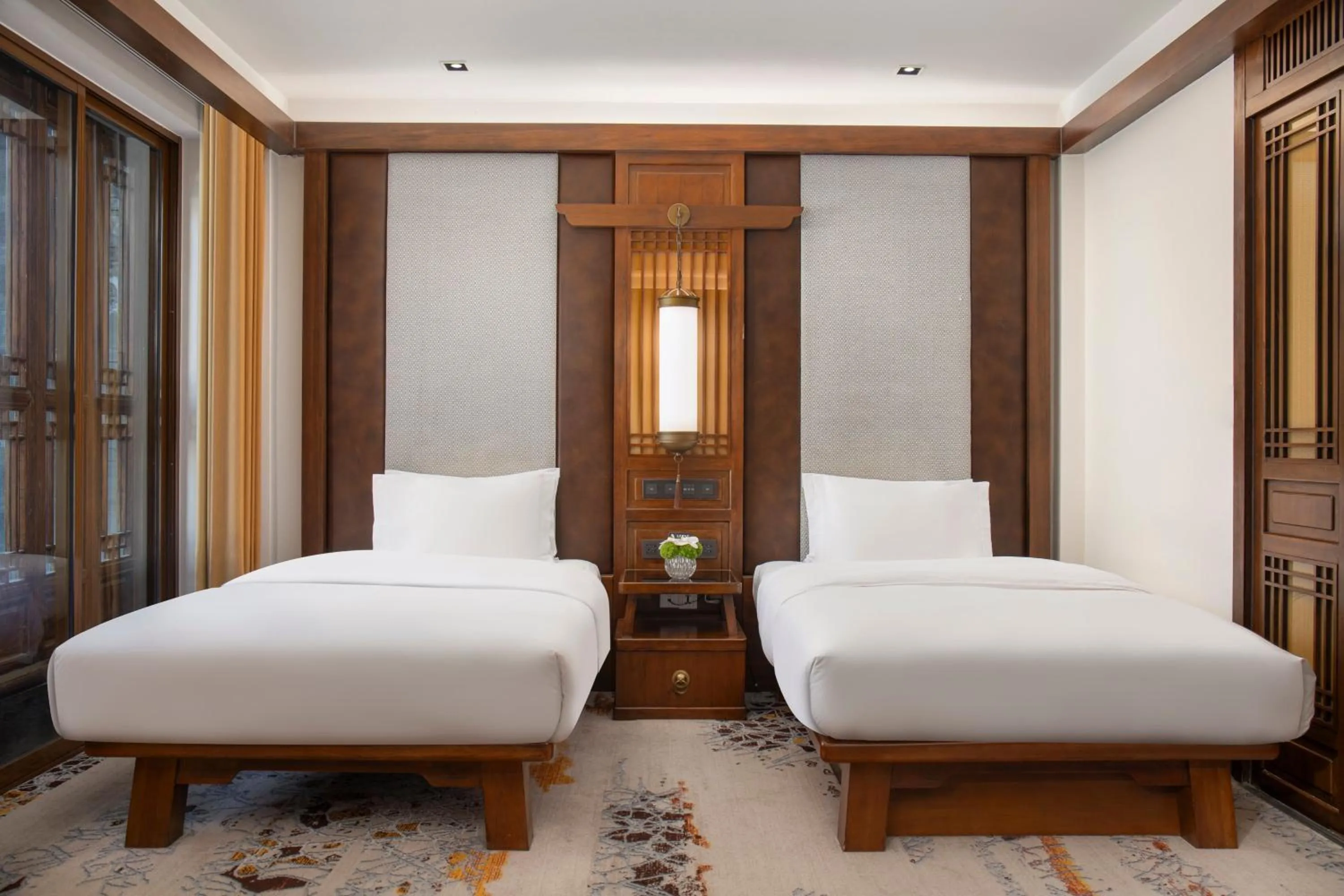 Photo of the whole room, Bed in InterContinental Lijiang Ancient Town Resort by IHG