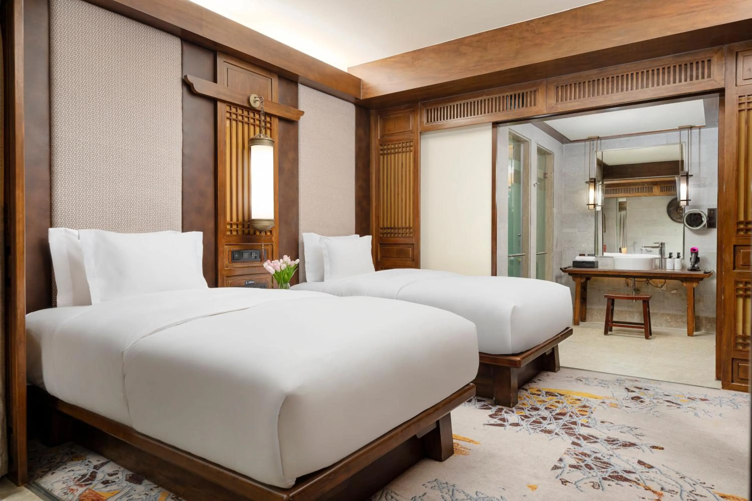 Photo of the whole room, Bed in InterContinental Lijiang Ancient Town Resort by IHG