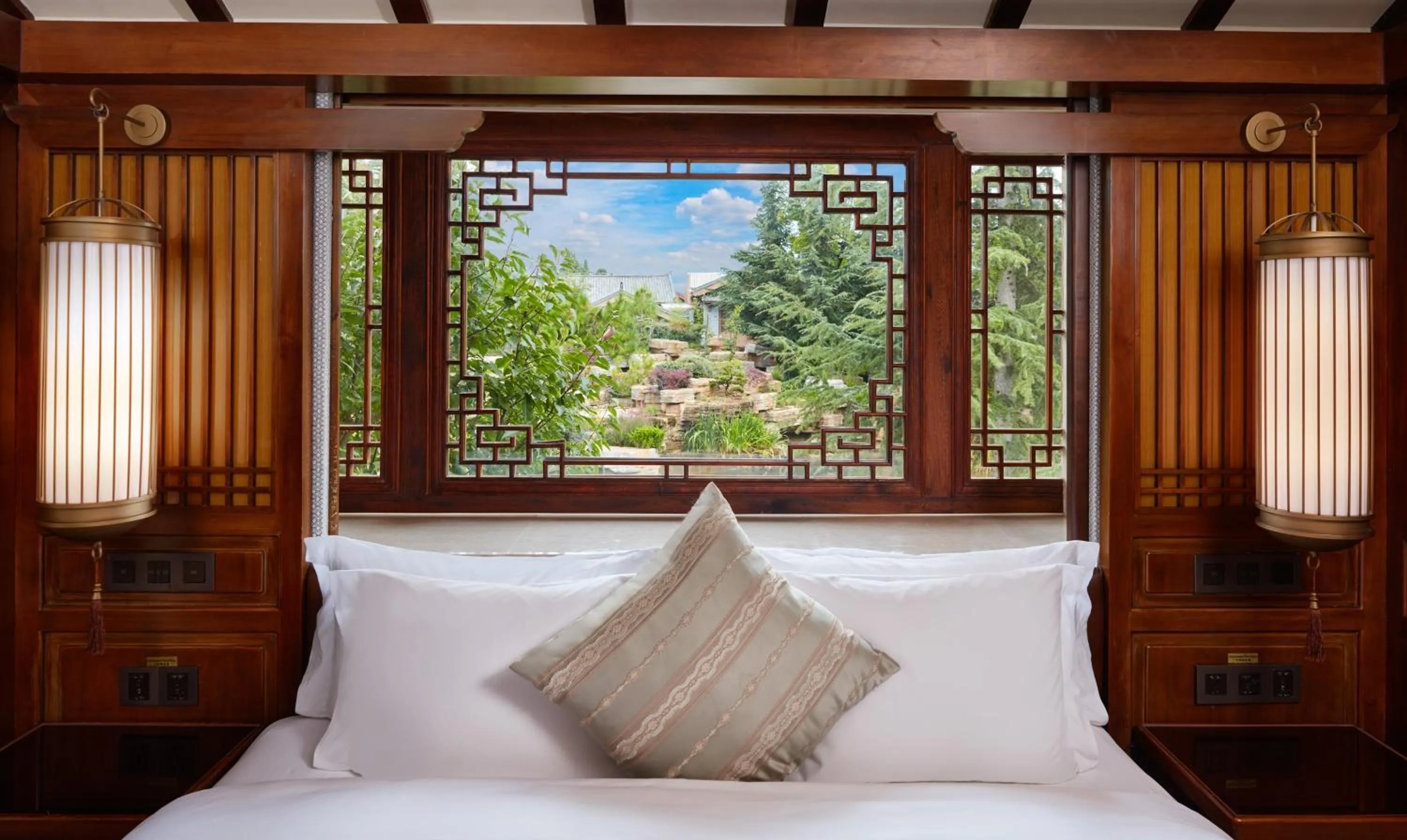 Photo of the whole room, Bed in InterContinental Lijiang Ancient Town Resort by IHG