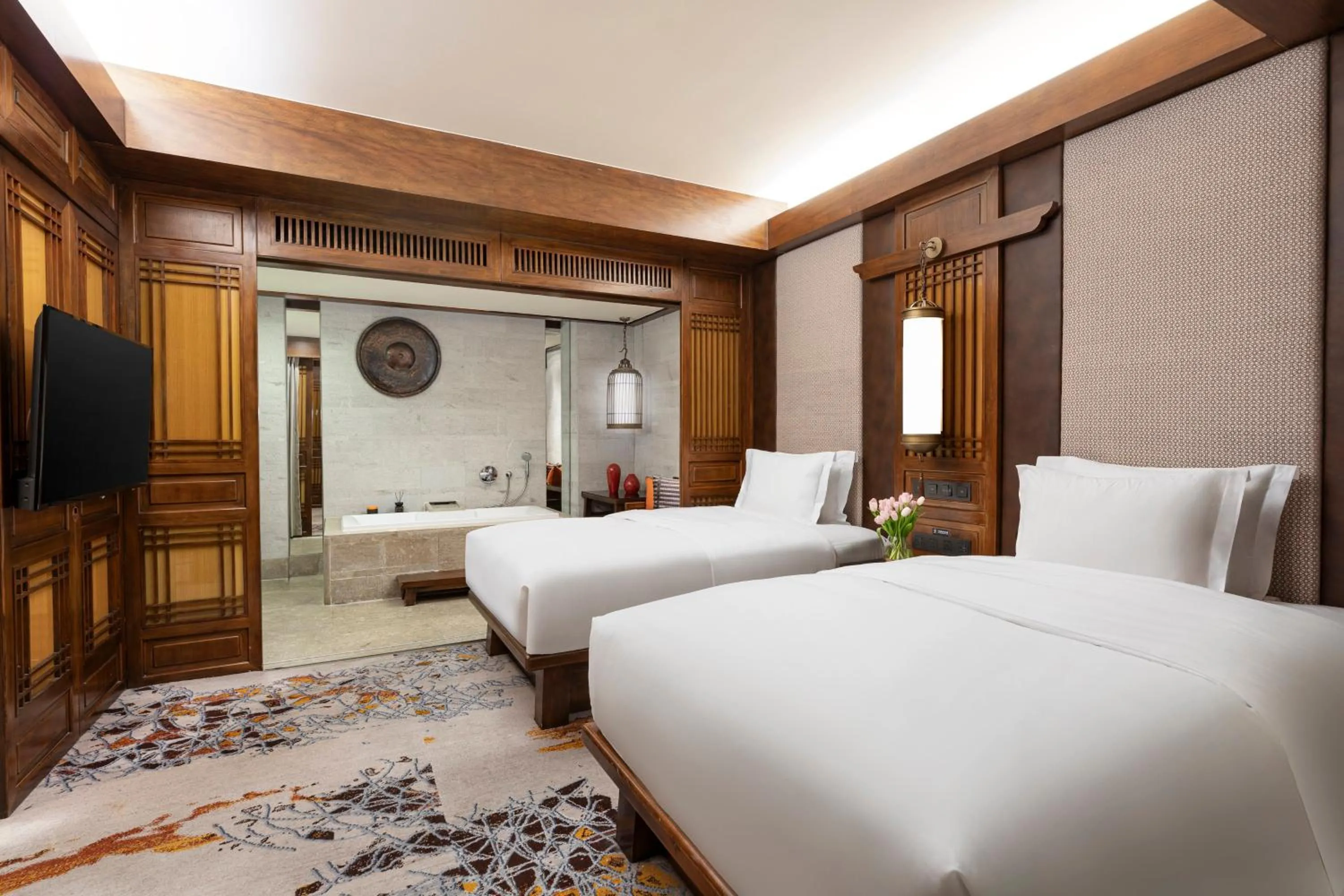 Photo of the whole room, Bed in InterContinental Lijiang Ancient Town Resort by IHG