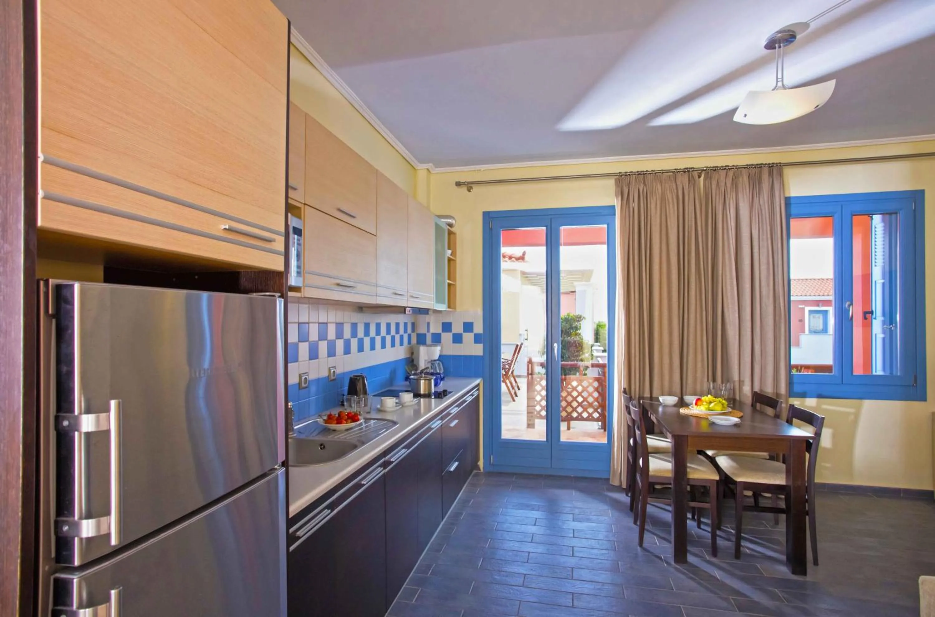 Kitchen or kitchenette in Sirena Residence & Spa