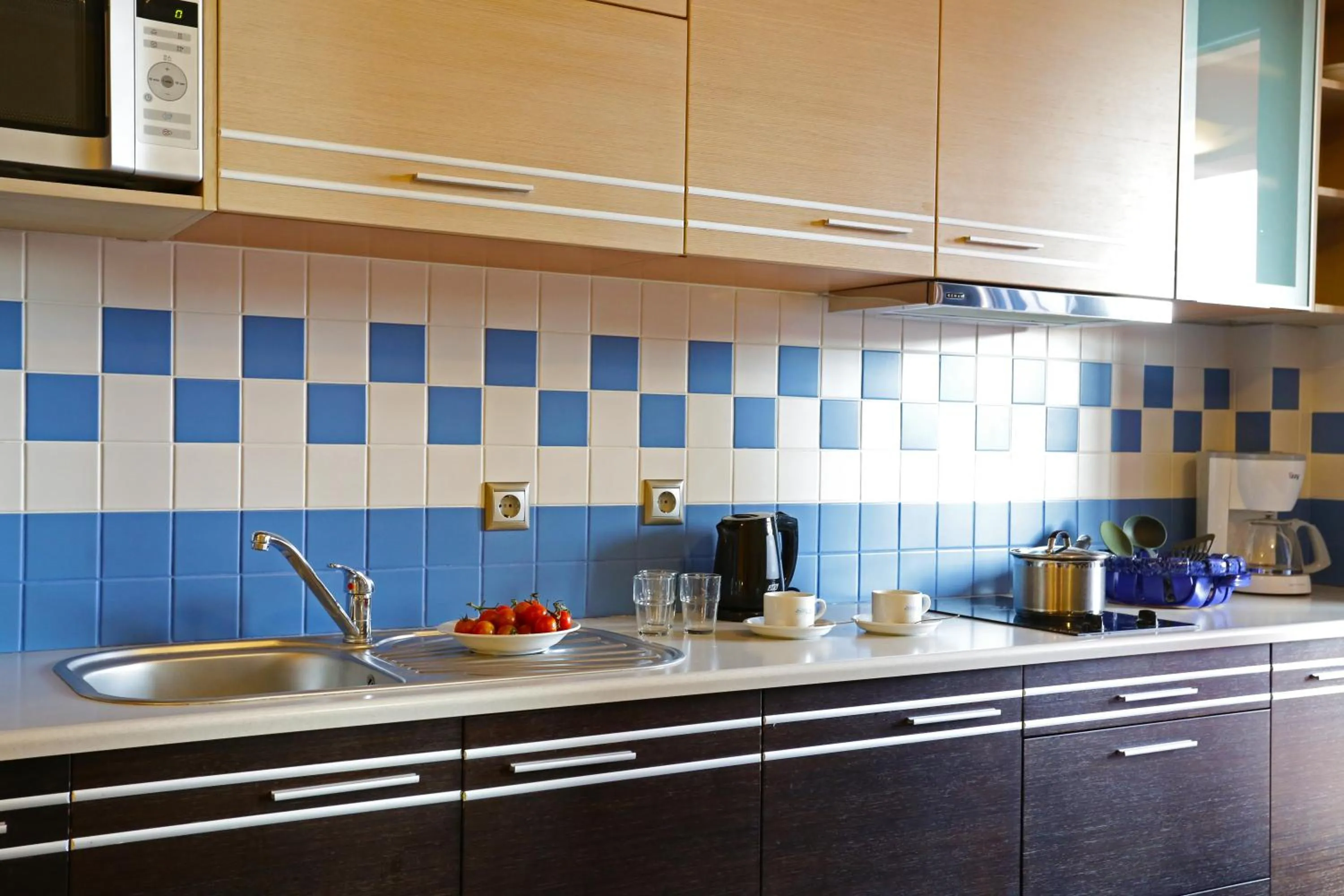 Kitchen or kitchenette in Sirena Residence & Spa