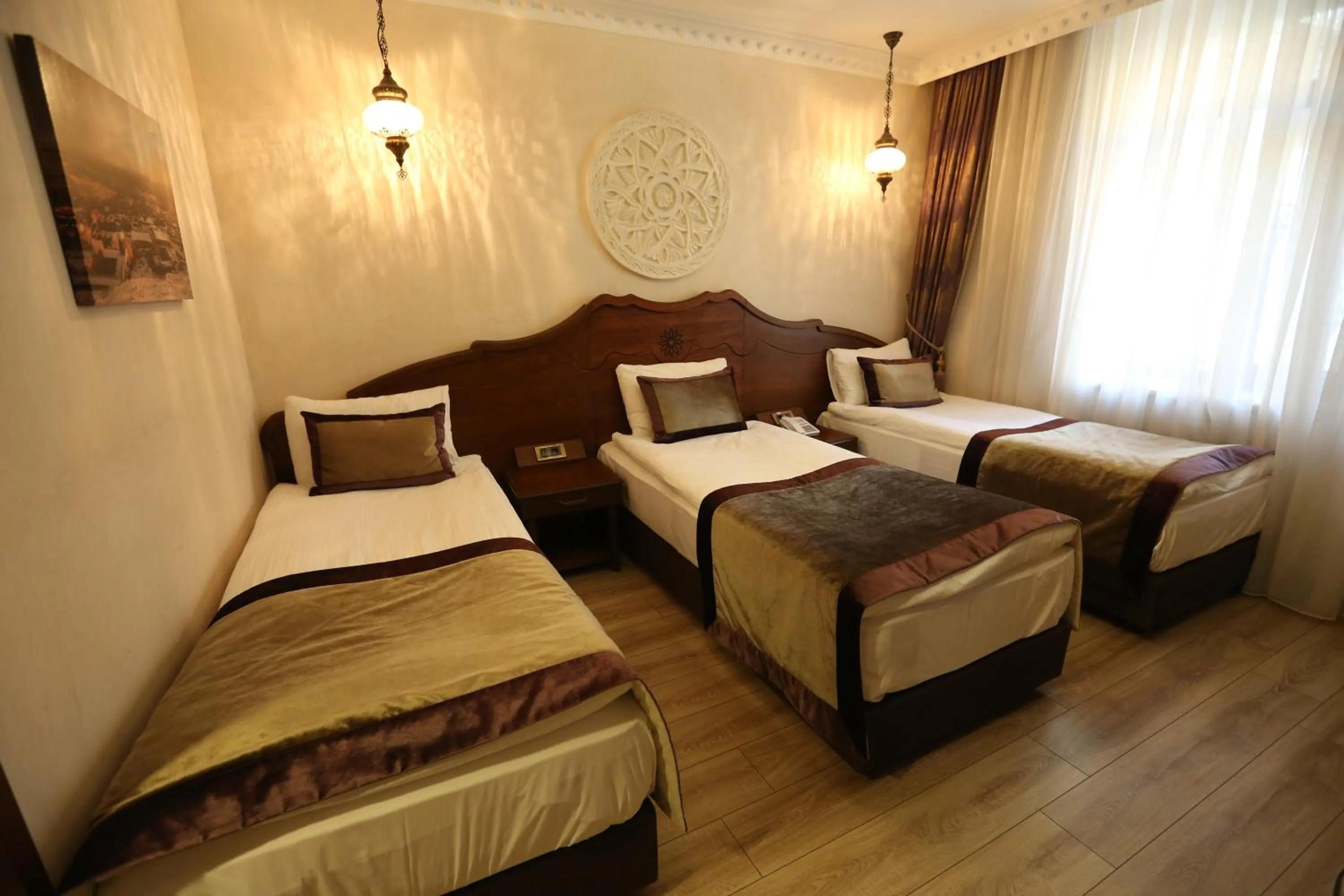 Bed in Kaya Ninova Hotel