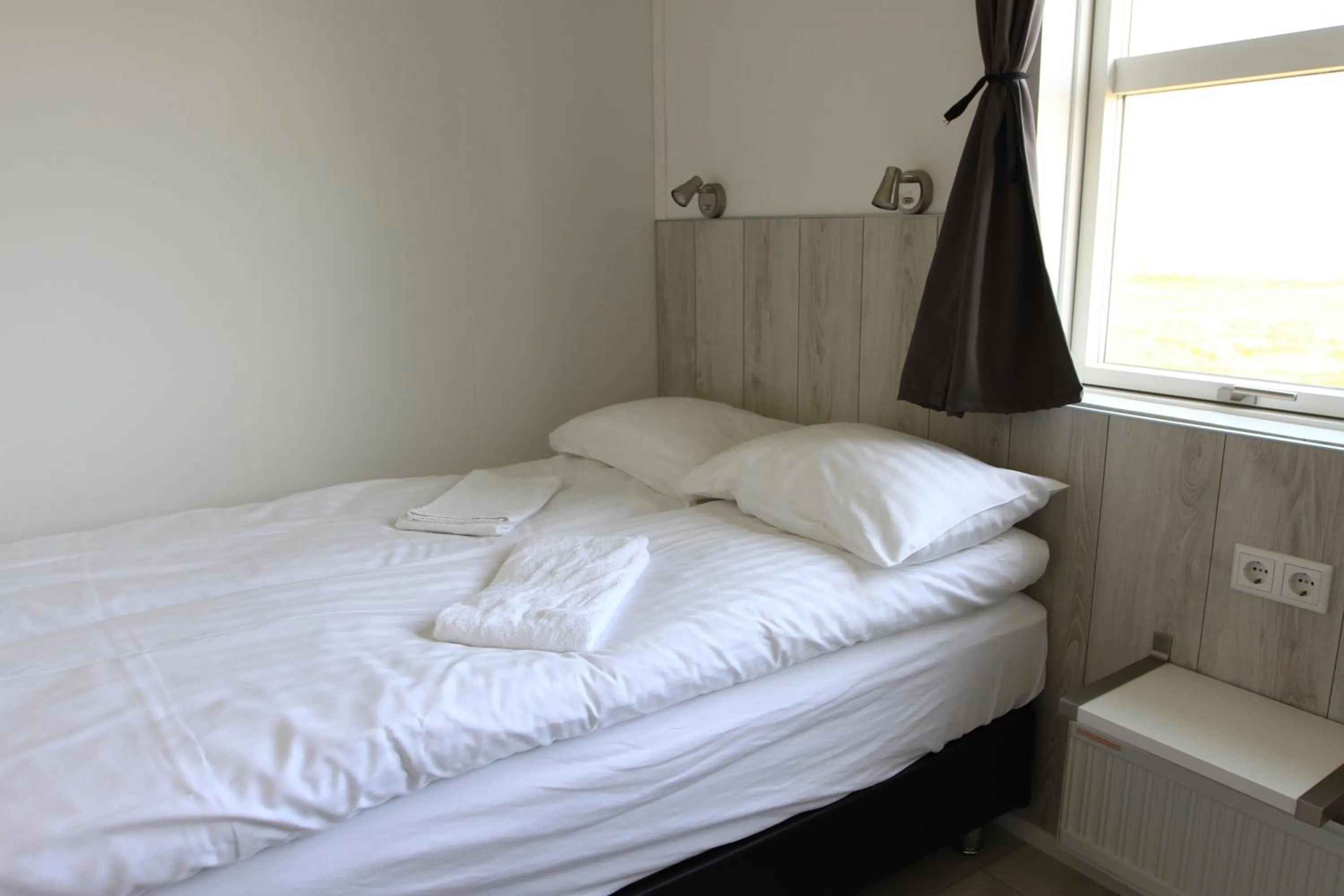 Bed in Aurora Cabins