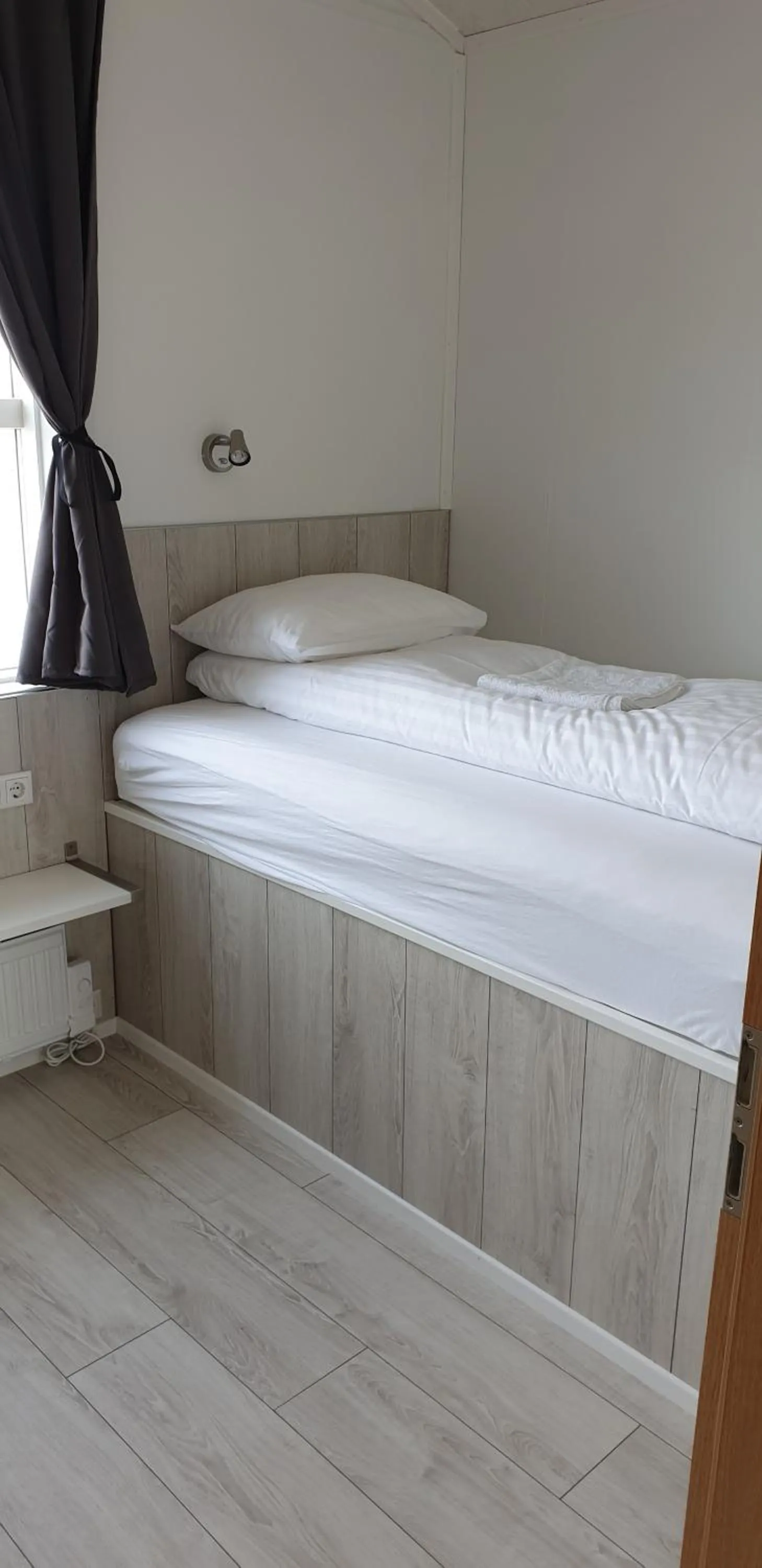 Bed in Aurora Cabins