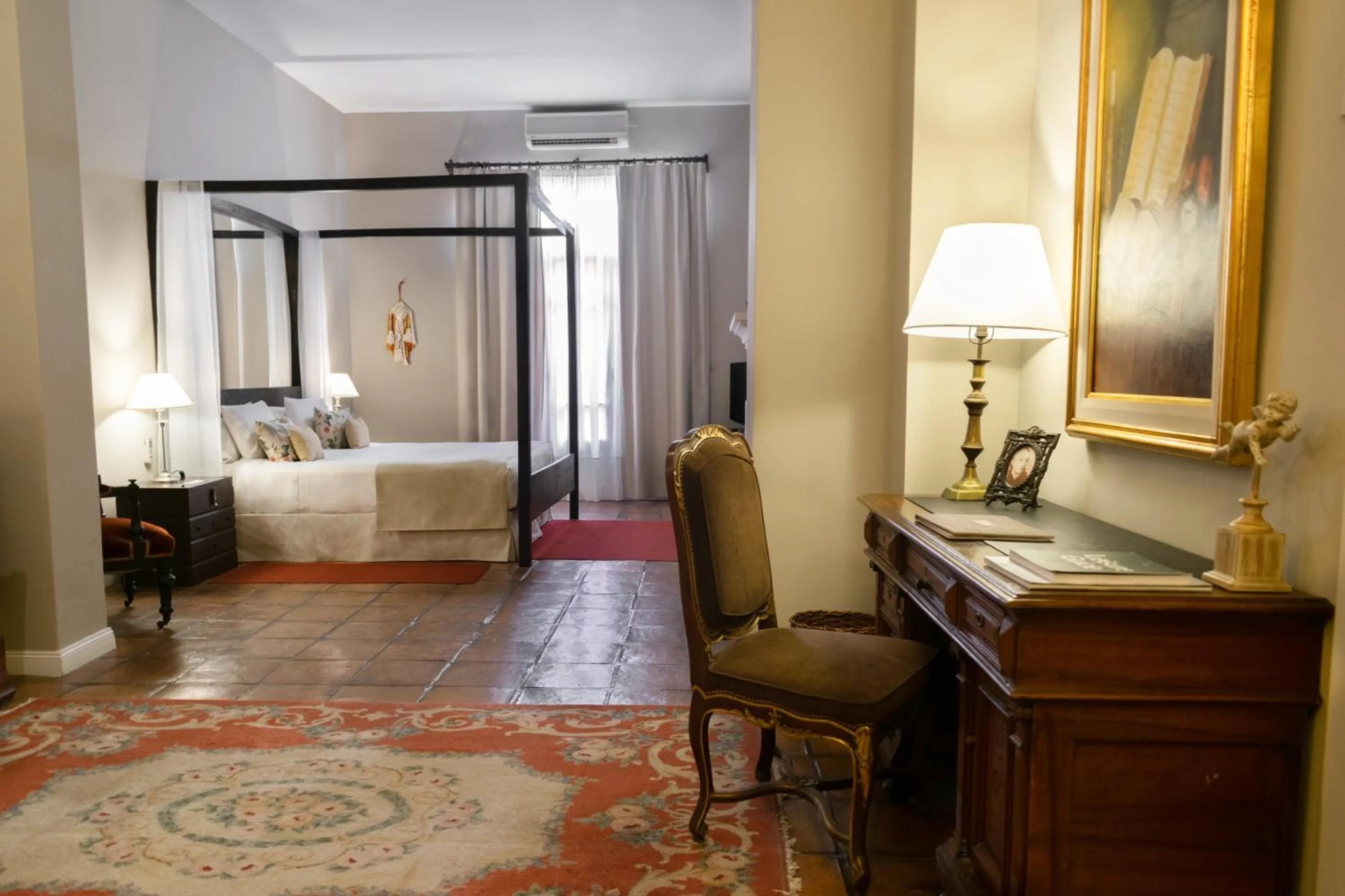 Seating area, Bed in Legado Mitico Salta Hotel Boutique