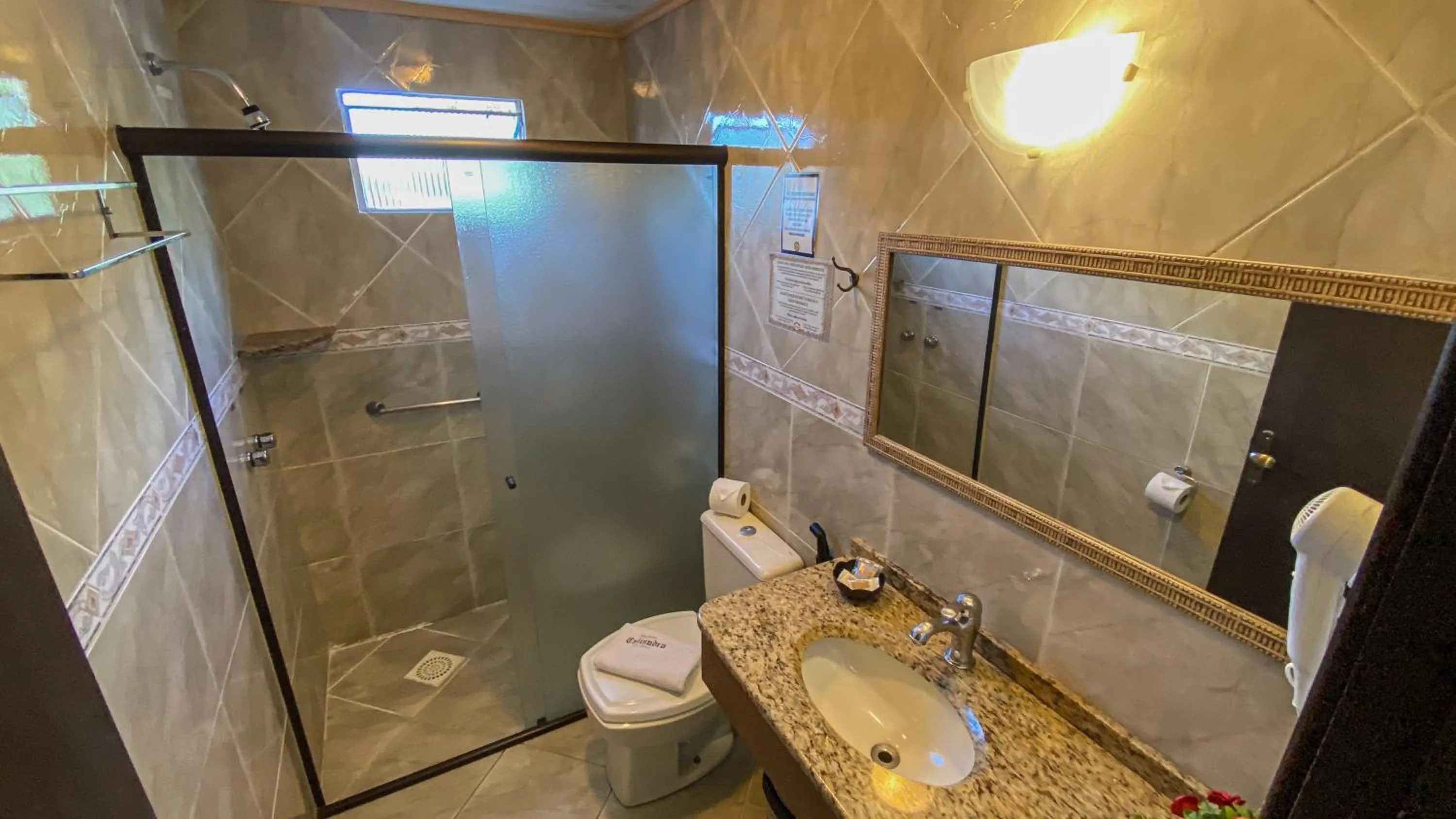 Toilet in Pousada Caliandra Da Serra