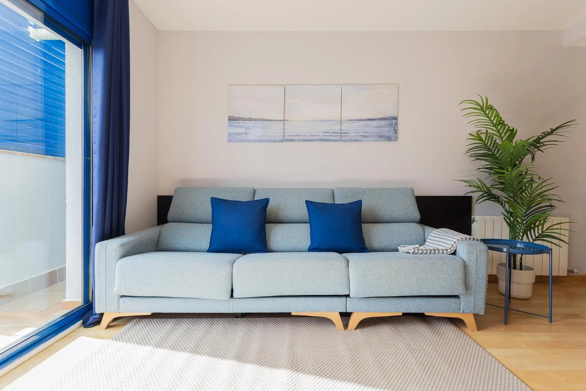 Living room in Lucas House Apartments by Sitges Group