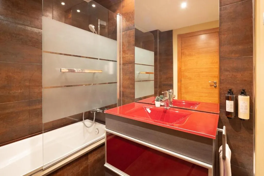 Bathroom in Lucas House Apartments by Sitges Group