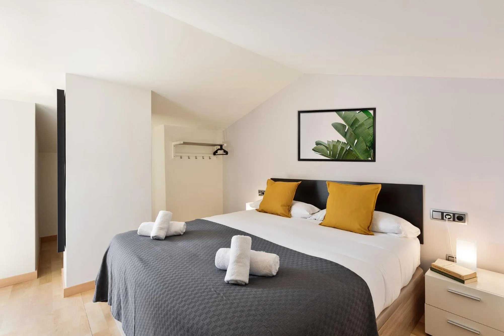 Bed in Lucas House Apartments by Sitges Group