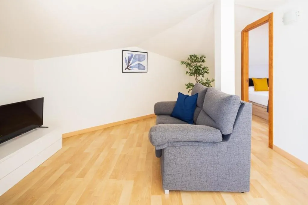 Living room in Lucas House Apartments by Sitges Group