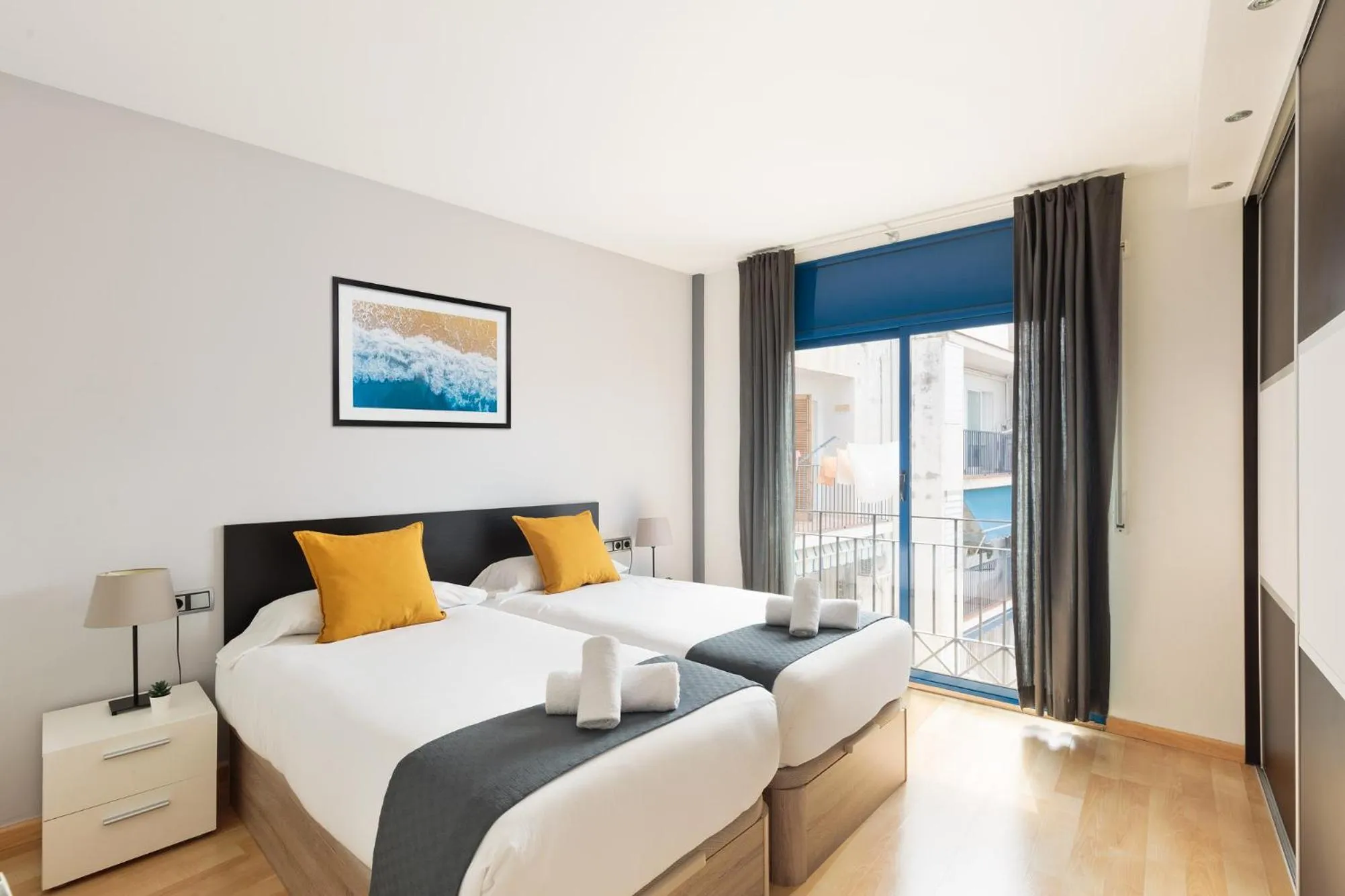 Bed in Lucas House Apartments by Sitges Group