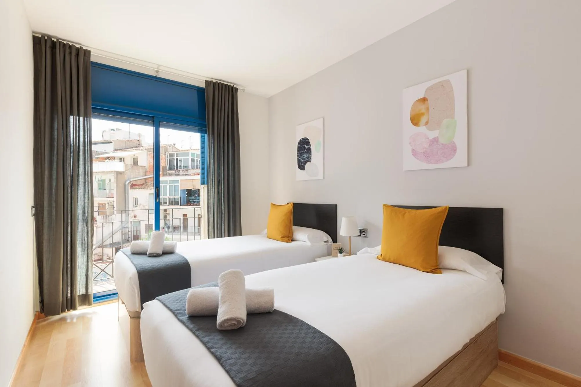 Bed in Lucas House Apartments by Sitges Group