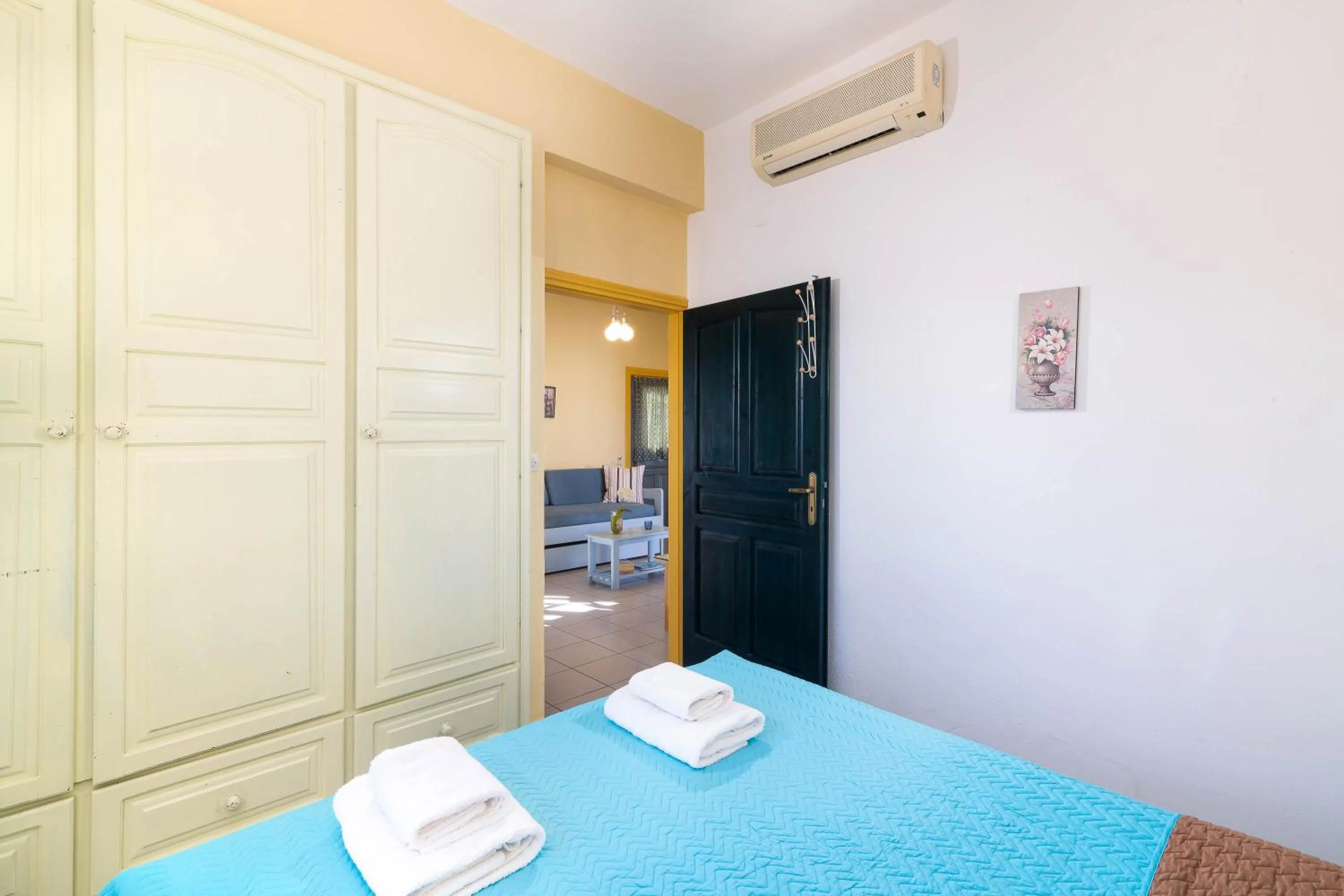 Bed in Afroditi Apartments