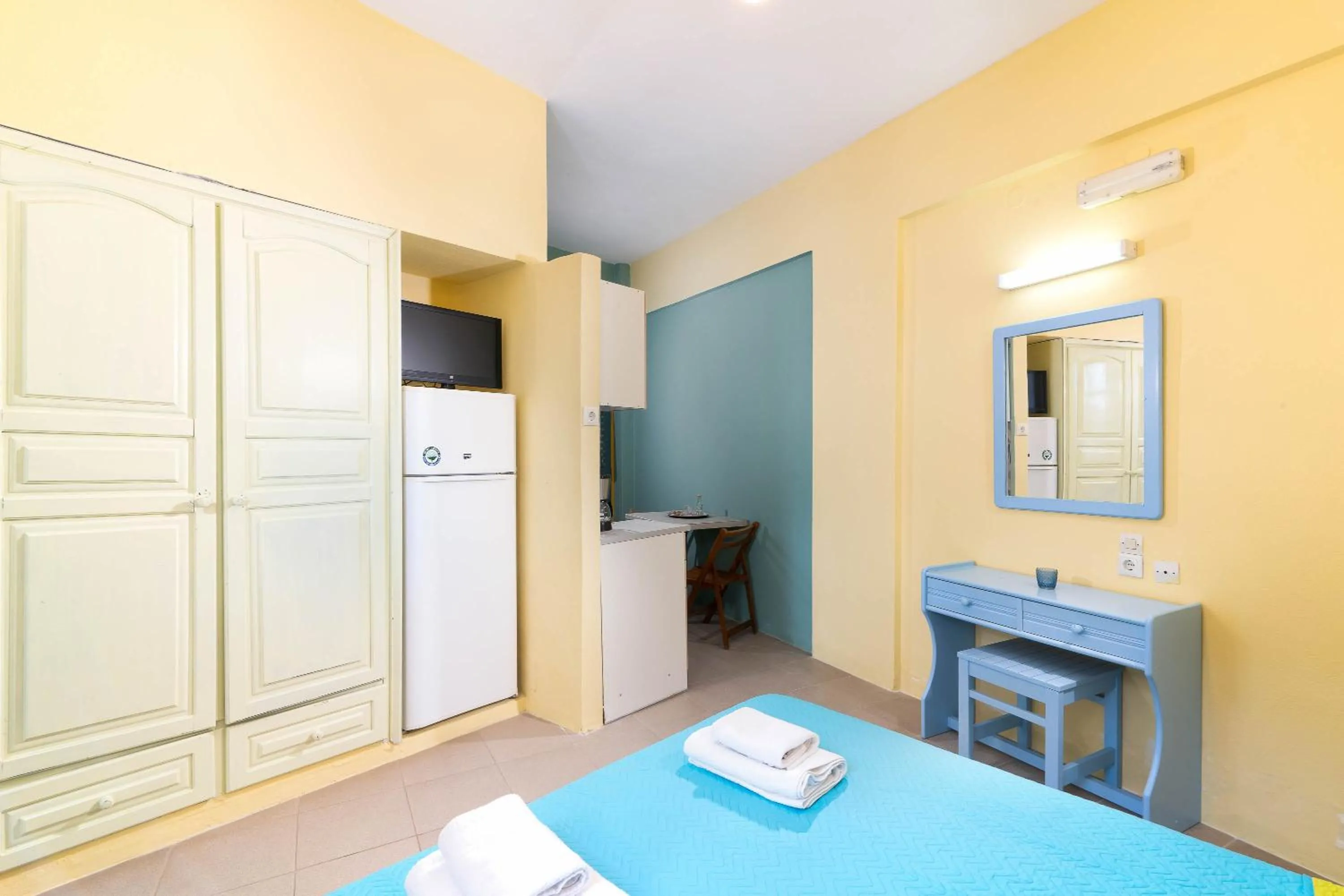 Bed in Afroditi Apartments