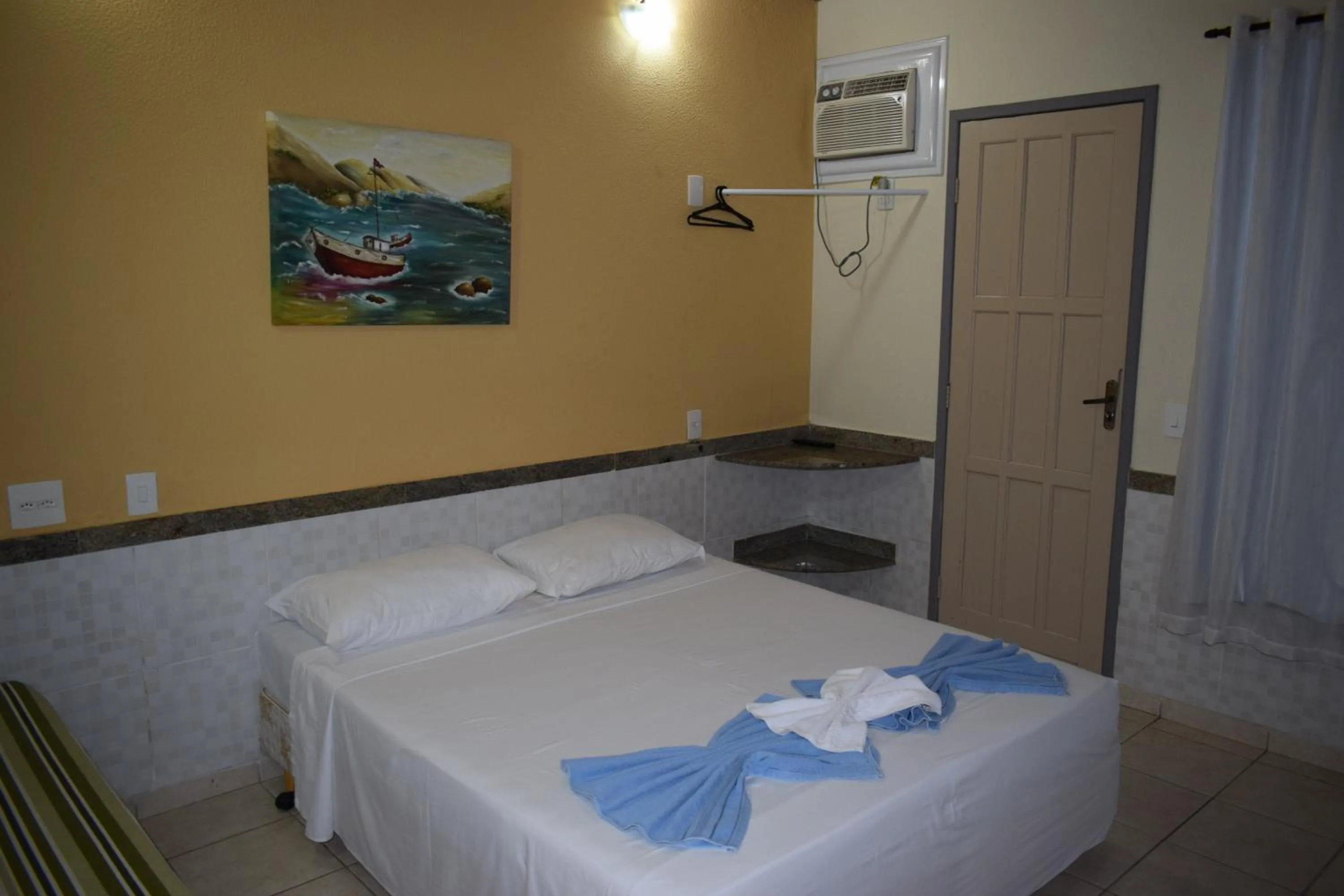 Photo of the whole room, Bed in Duas Praias Hotel Pousada