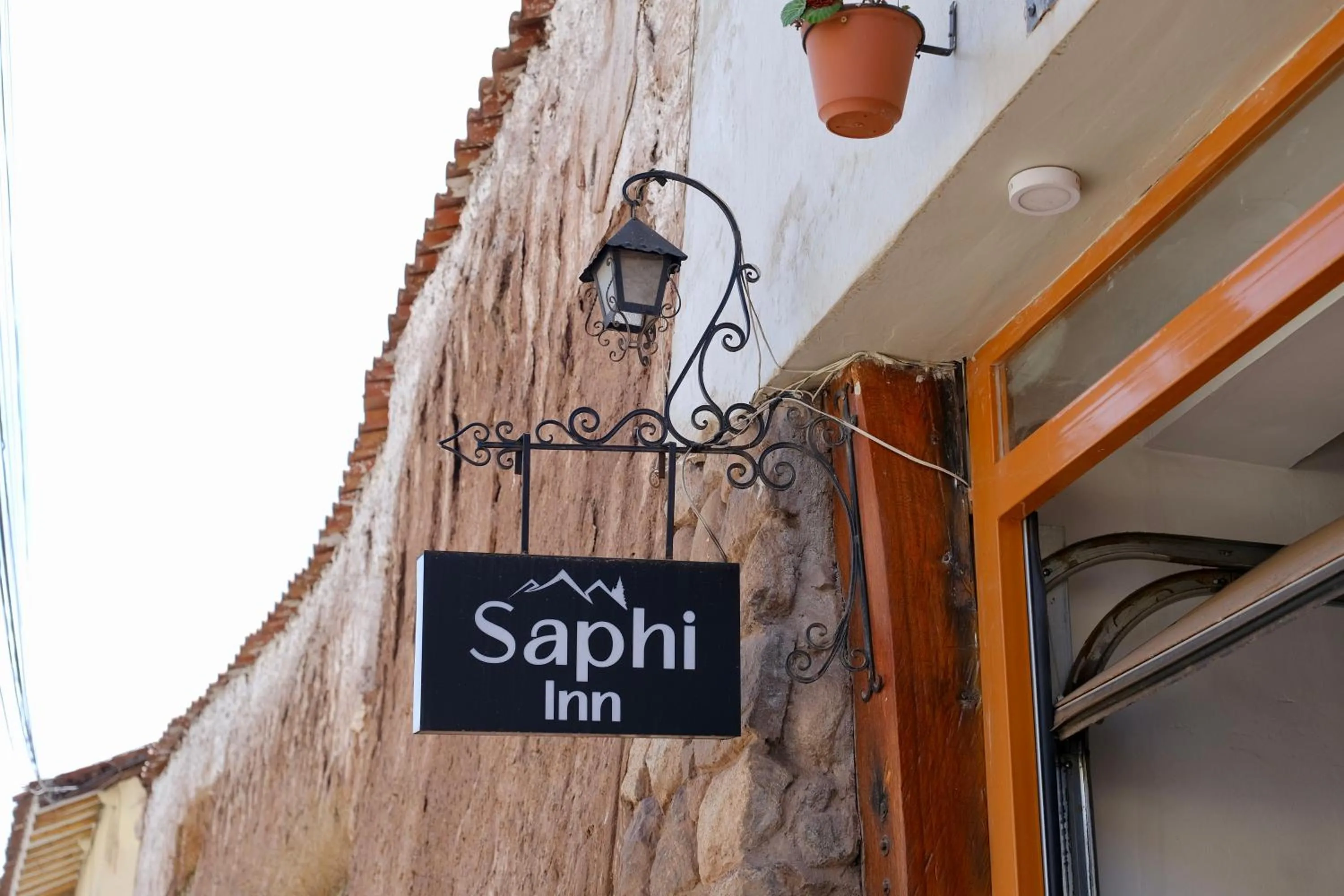 Property logo or sign in Saphi Inn Cusco - Excelente ubicación