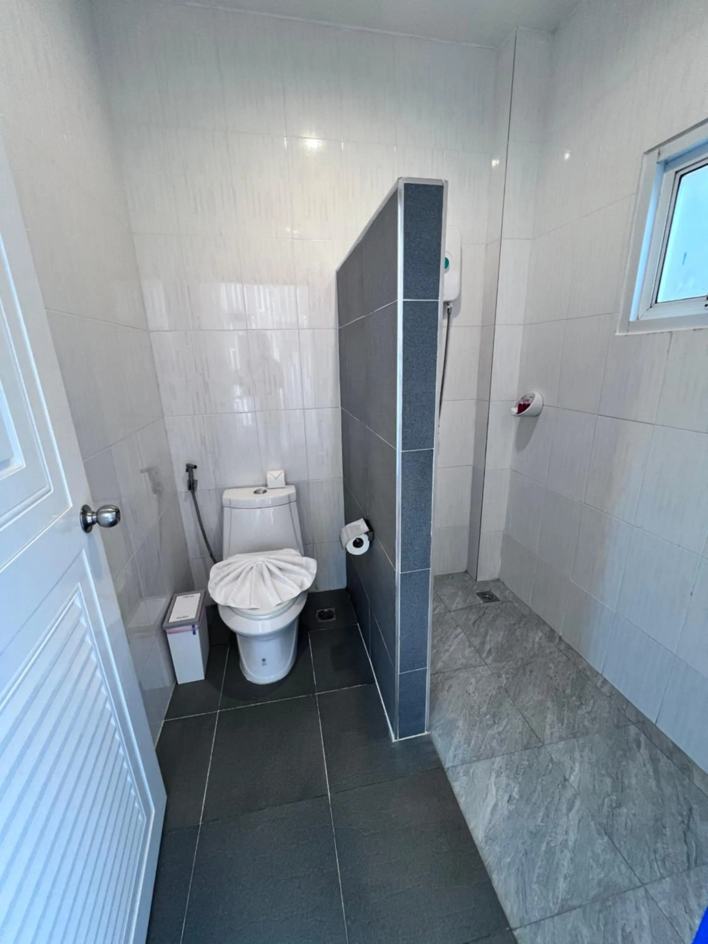 Shower in Three Trees Samui Resort - Sarocha Villa