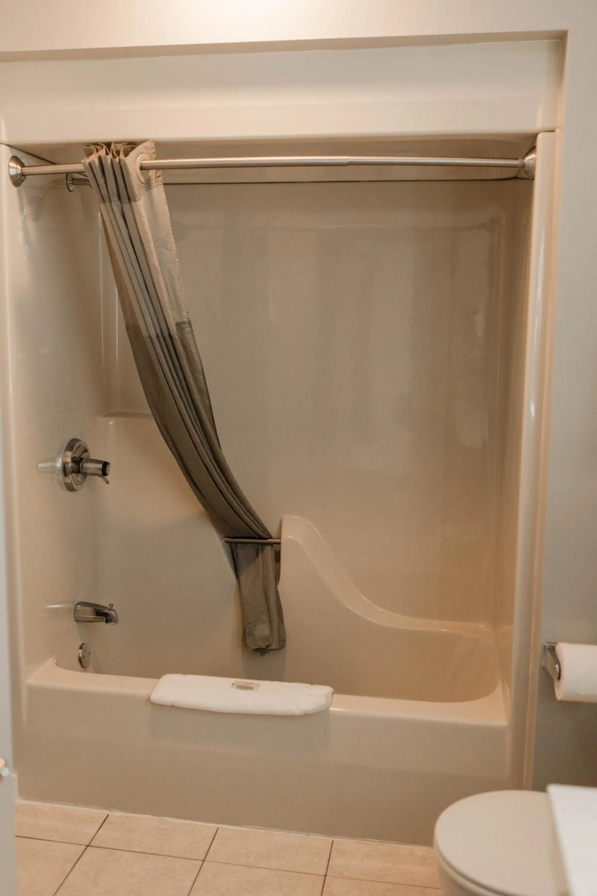 Bathroom in Travelodge by Wyndham Escanaba