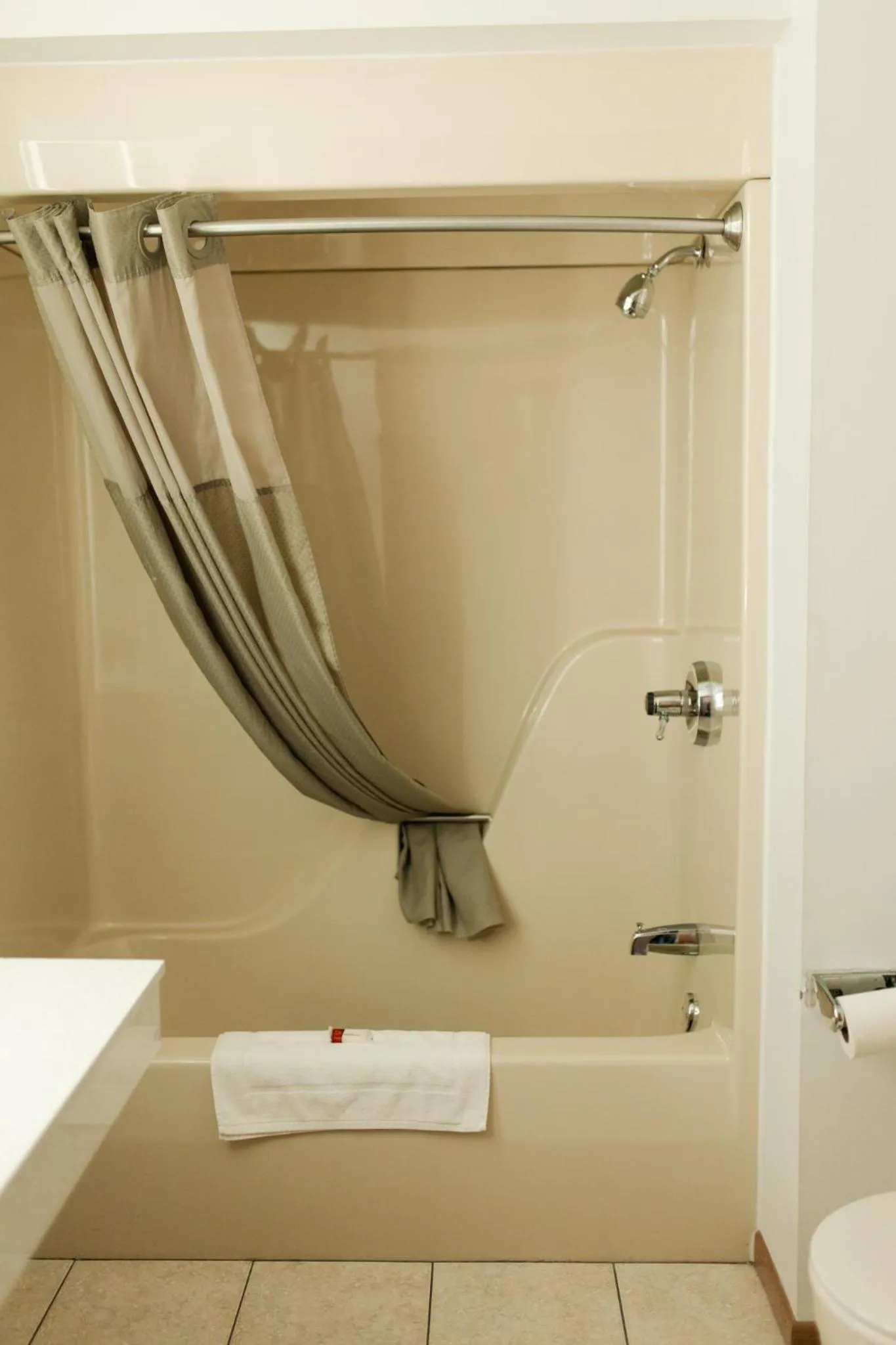 Bathroom in Travelodge by Wyndham Escanaba