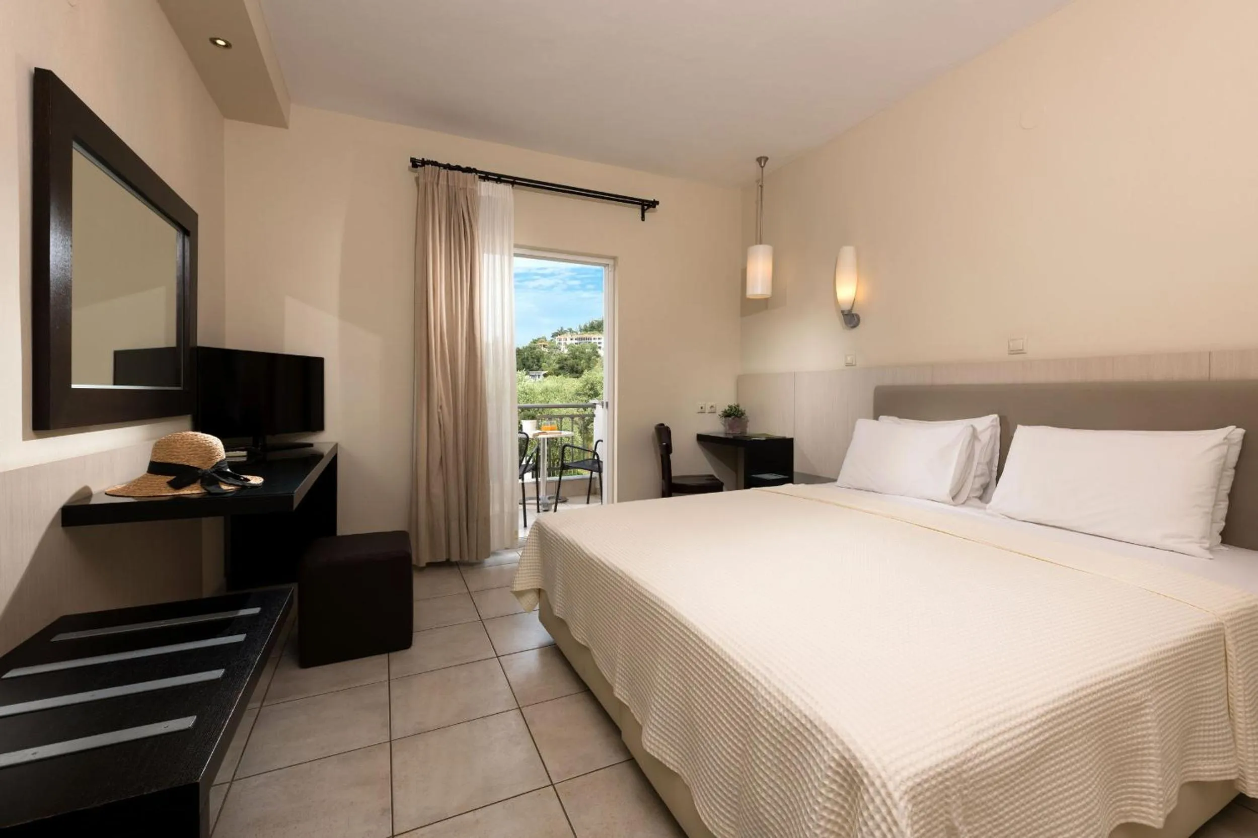 Bed in Louloudis Boutique Hotel