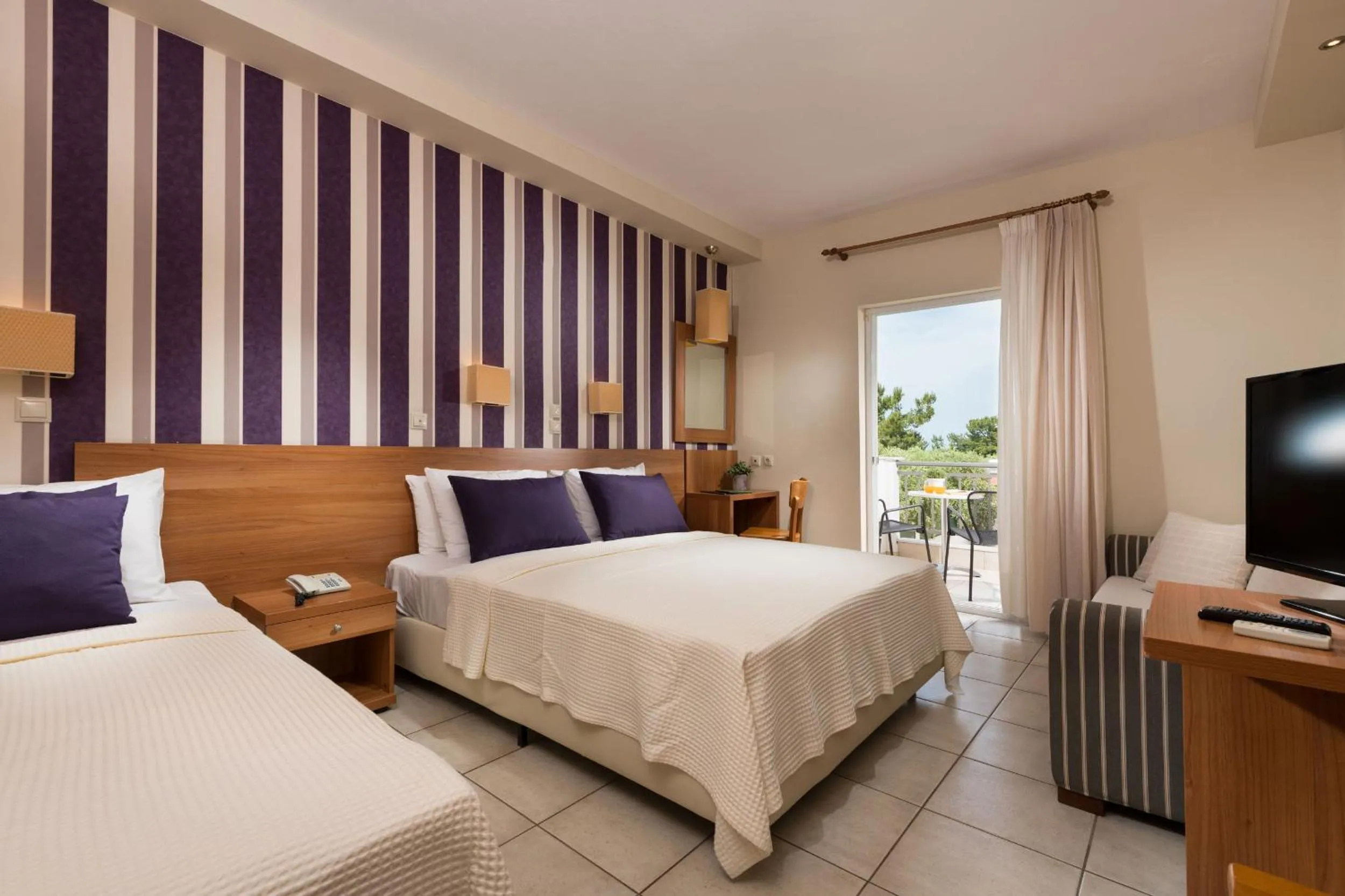 Bed in Louloudis Boutique Hotel