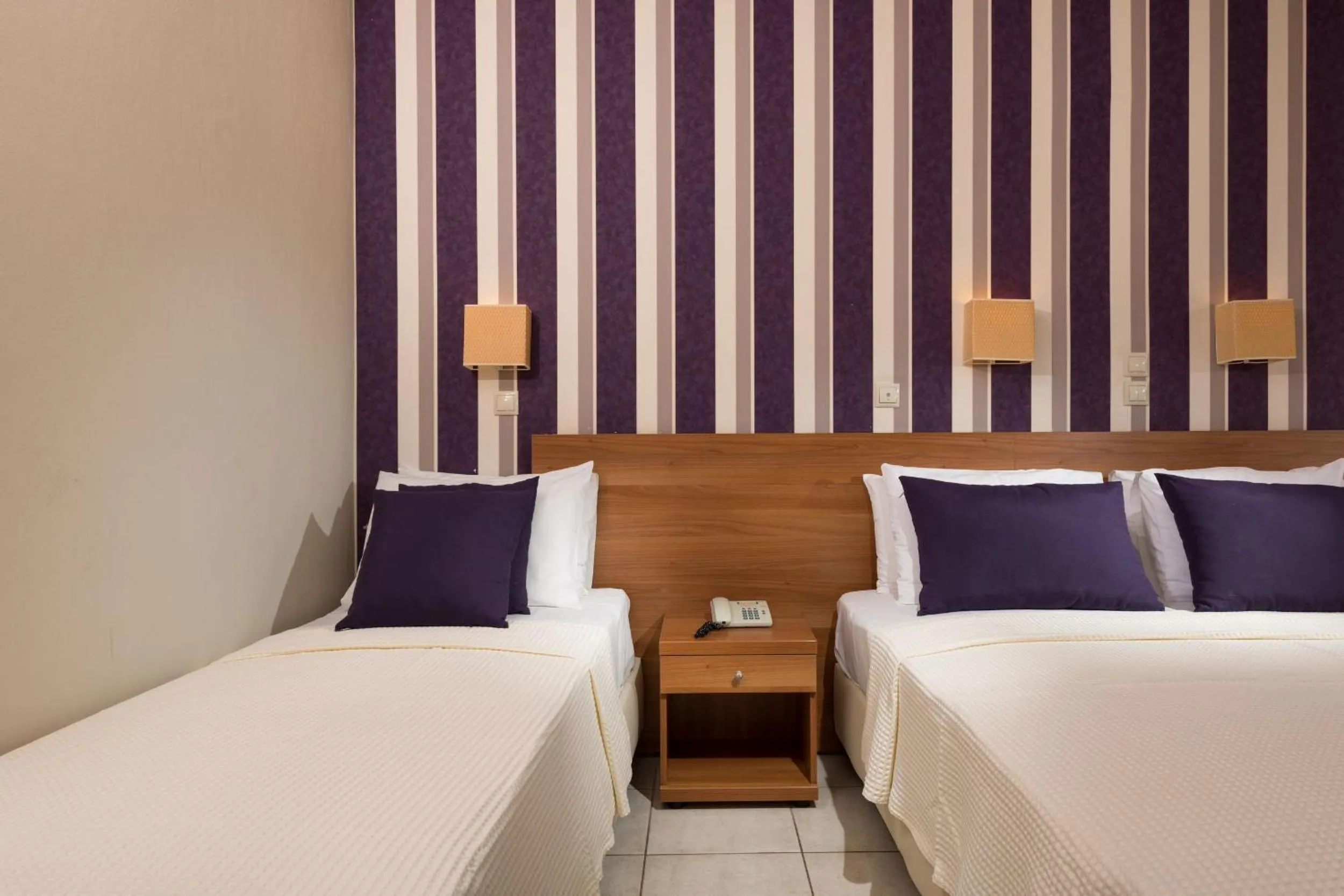 Bed in Louloudis Boutique Hotel