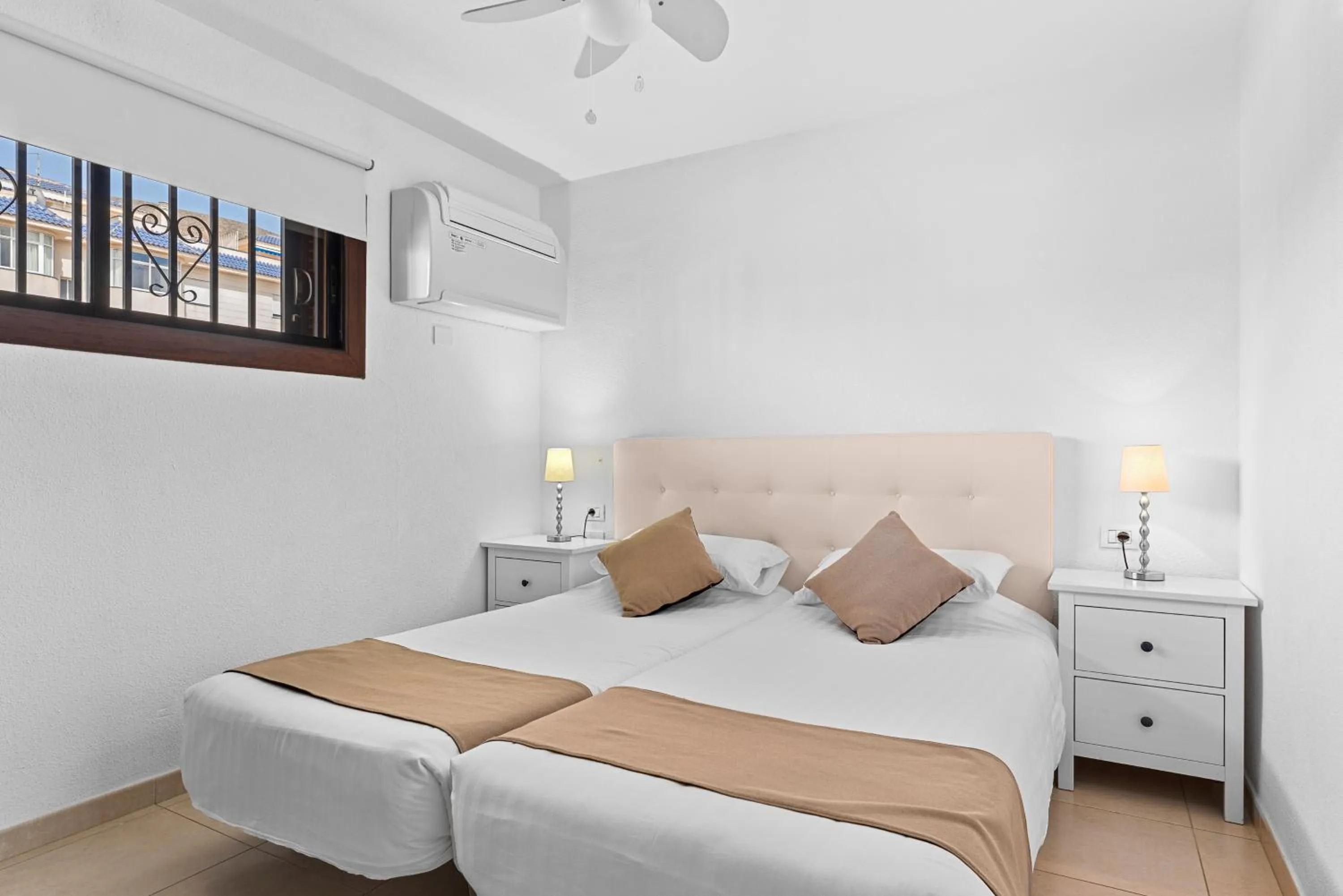 Bed in Paloma Beach Apartments