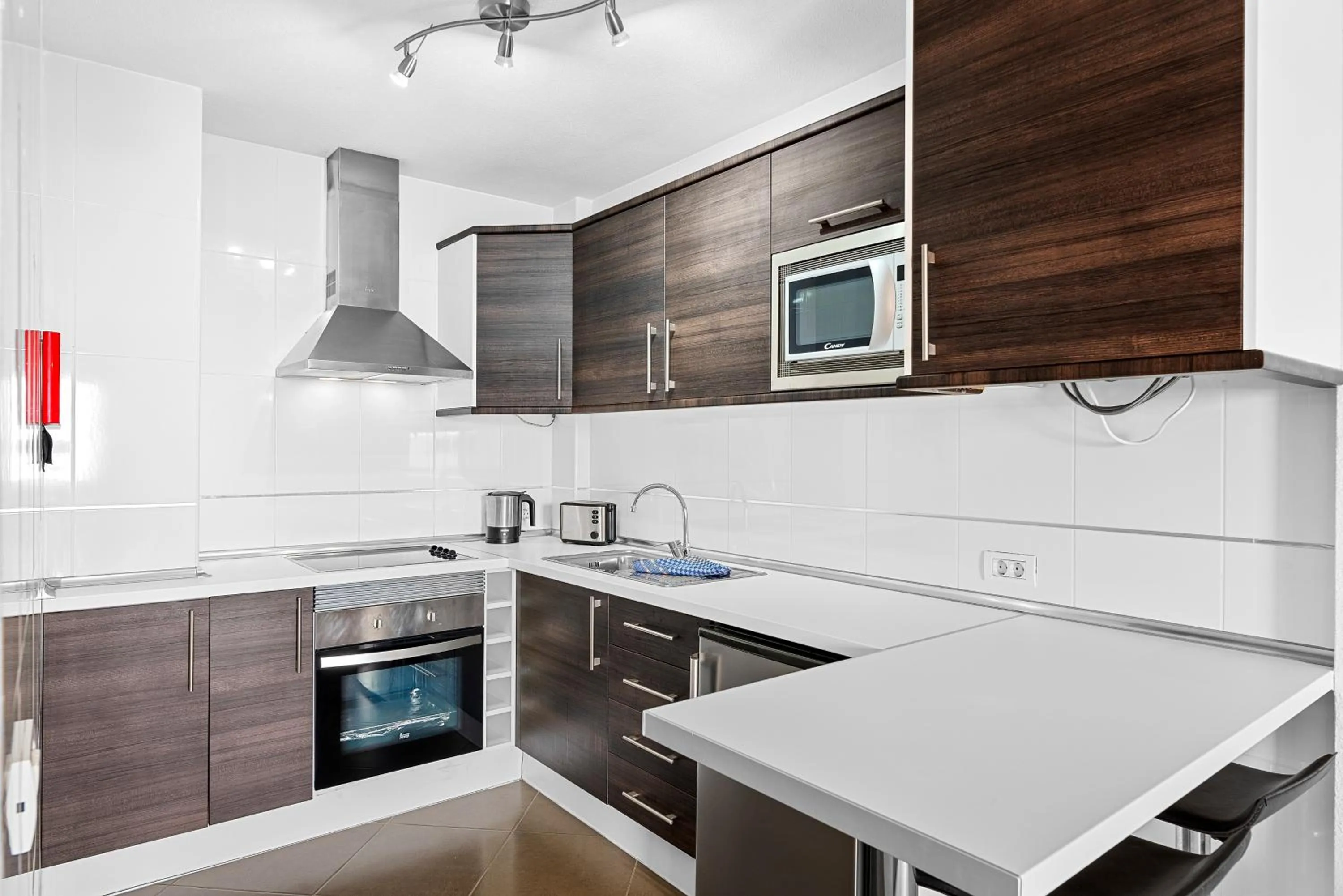 Kitchen or kitchenette in Paloma Beach Apartments