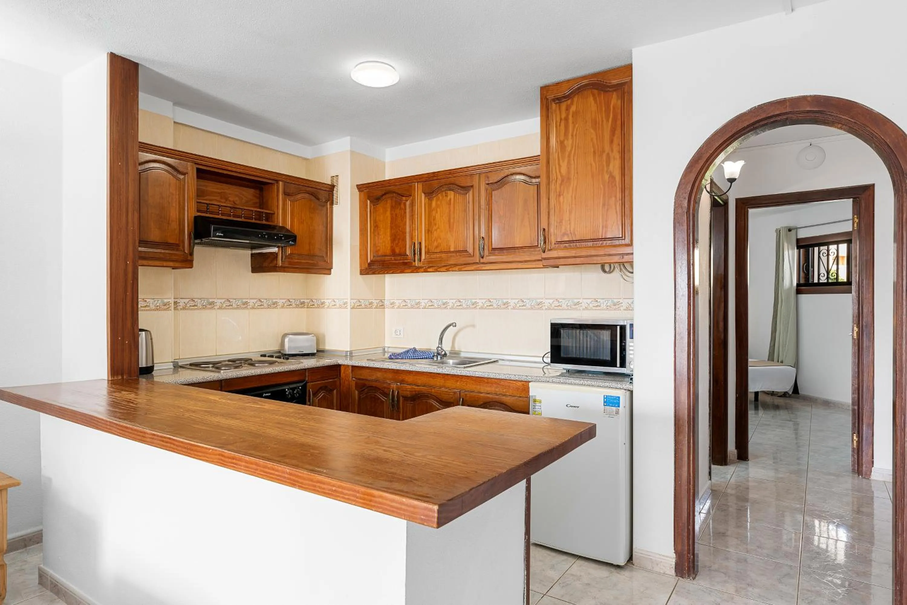 Kitchen or kitchenette in Paloma Beach Apartments