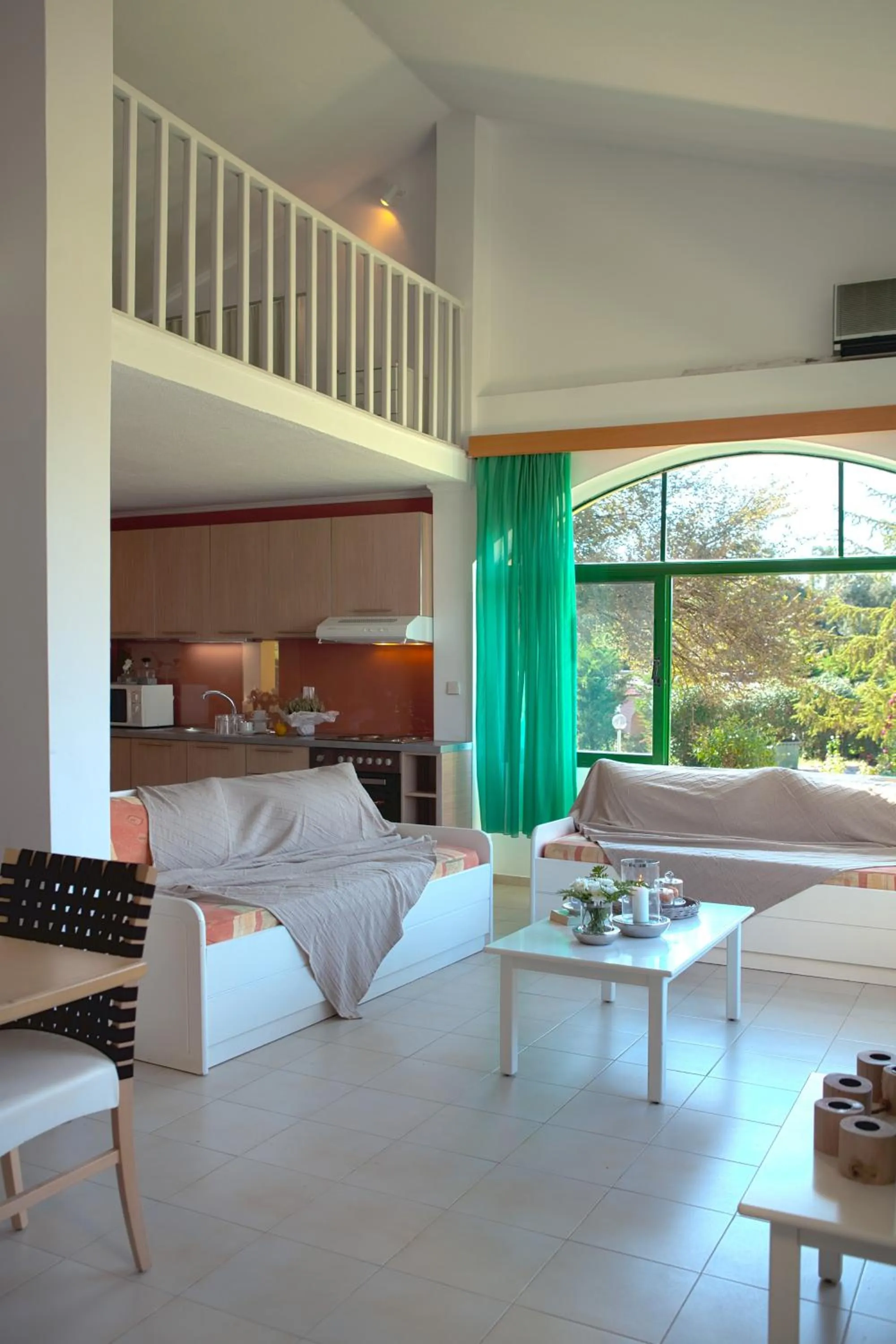 Seating area, Bed in Govino Bay