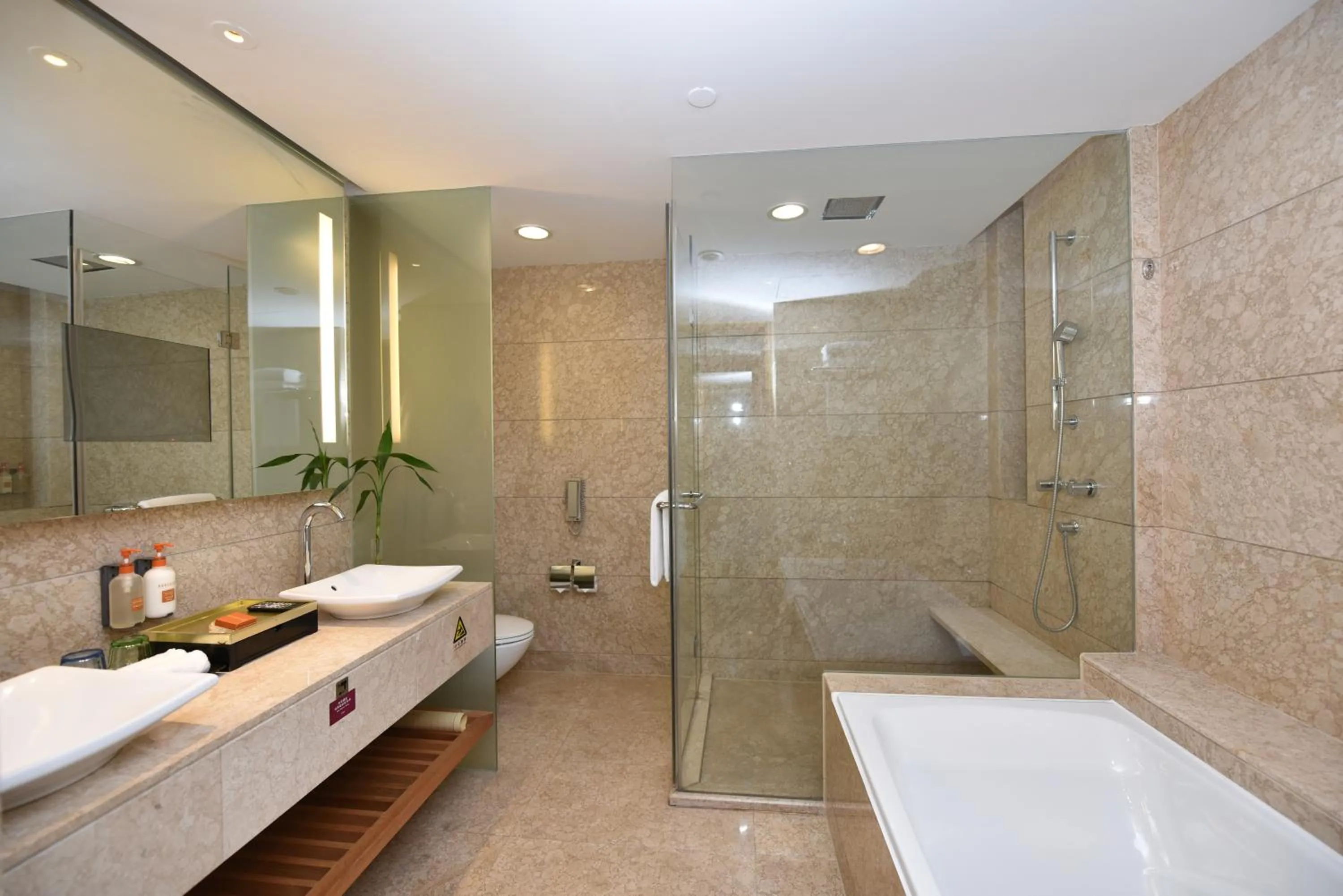 Toilet in Crowne Plaza Zhongshan Wing On City by IHG