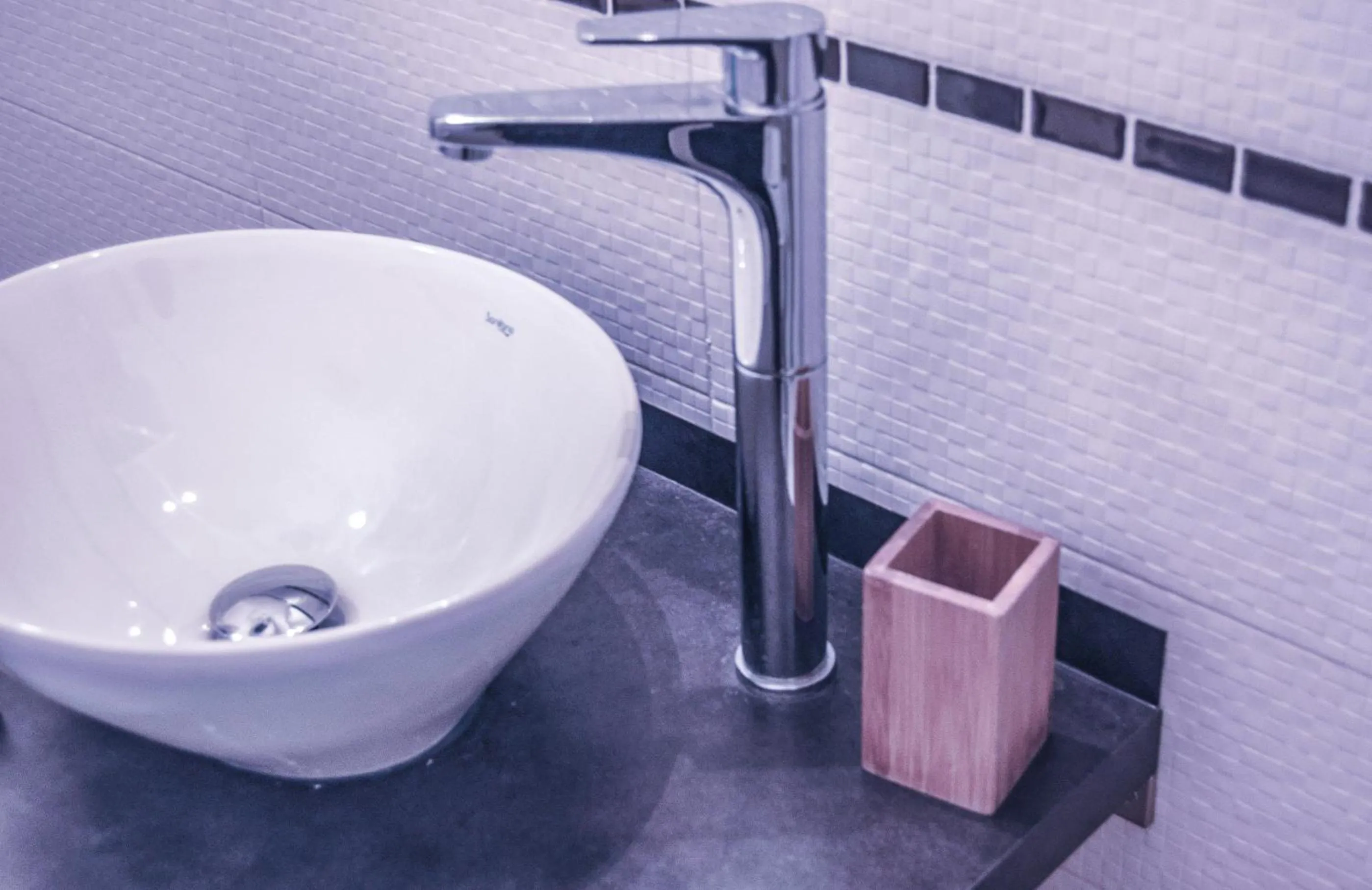 Toilet in Melo Accommodations