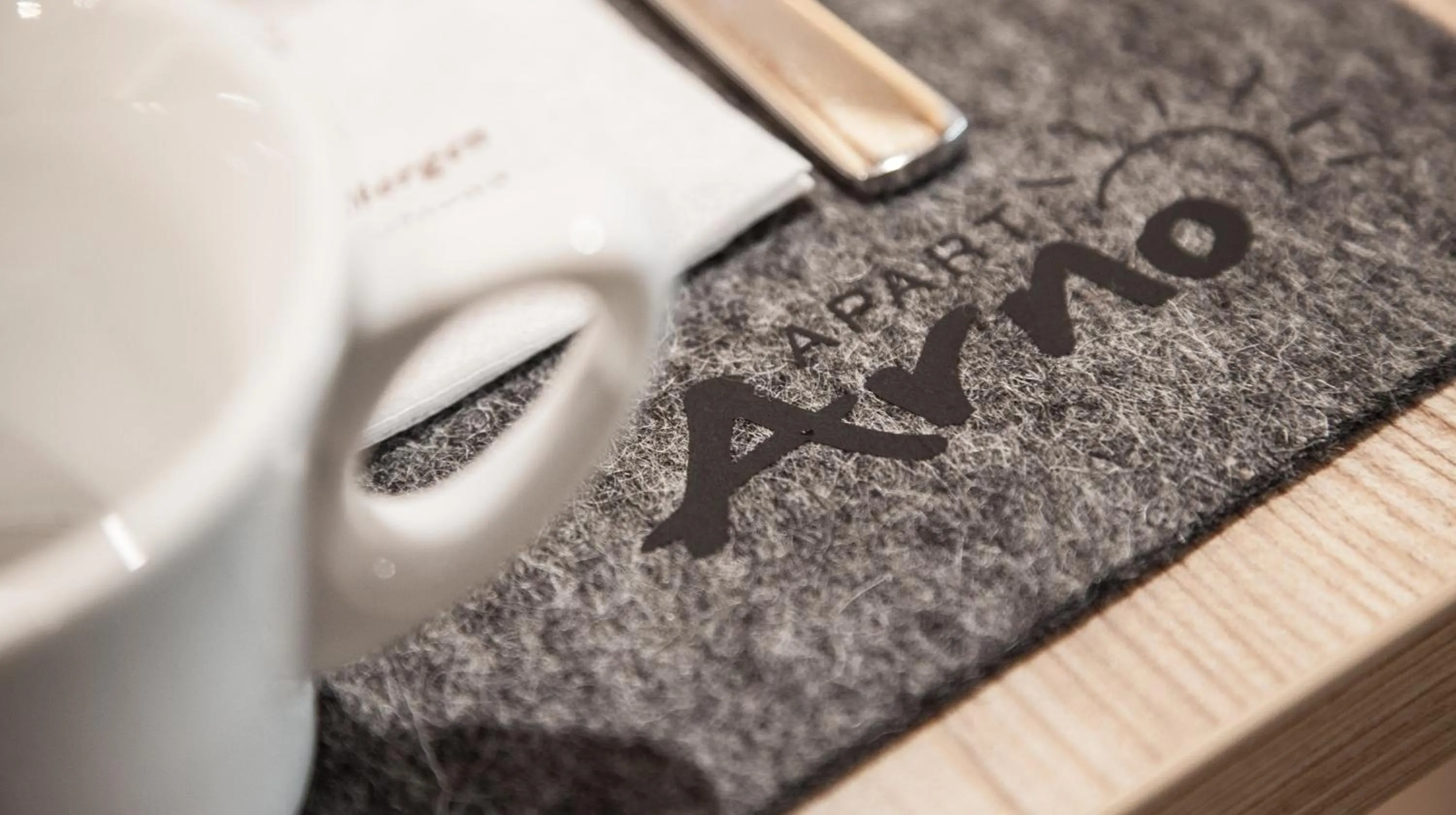 Text overlay in Apart Hotel Arno