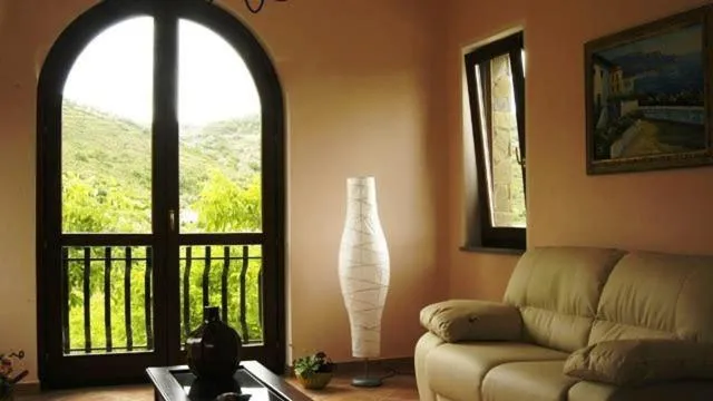 Communal lounge/ TV room in Villa Le Torrette