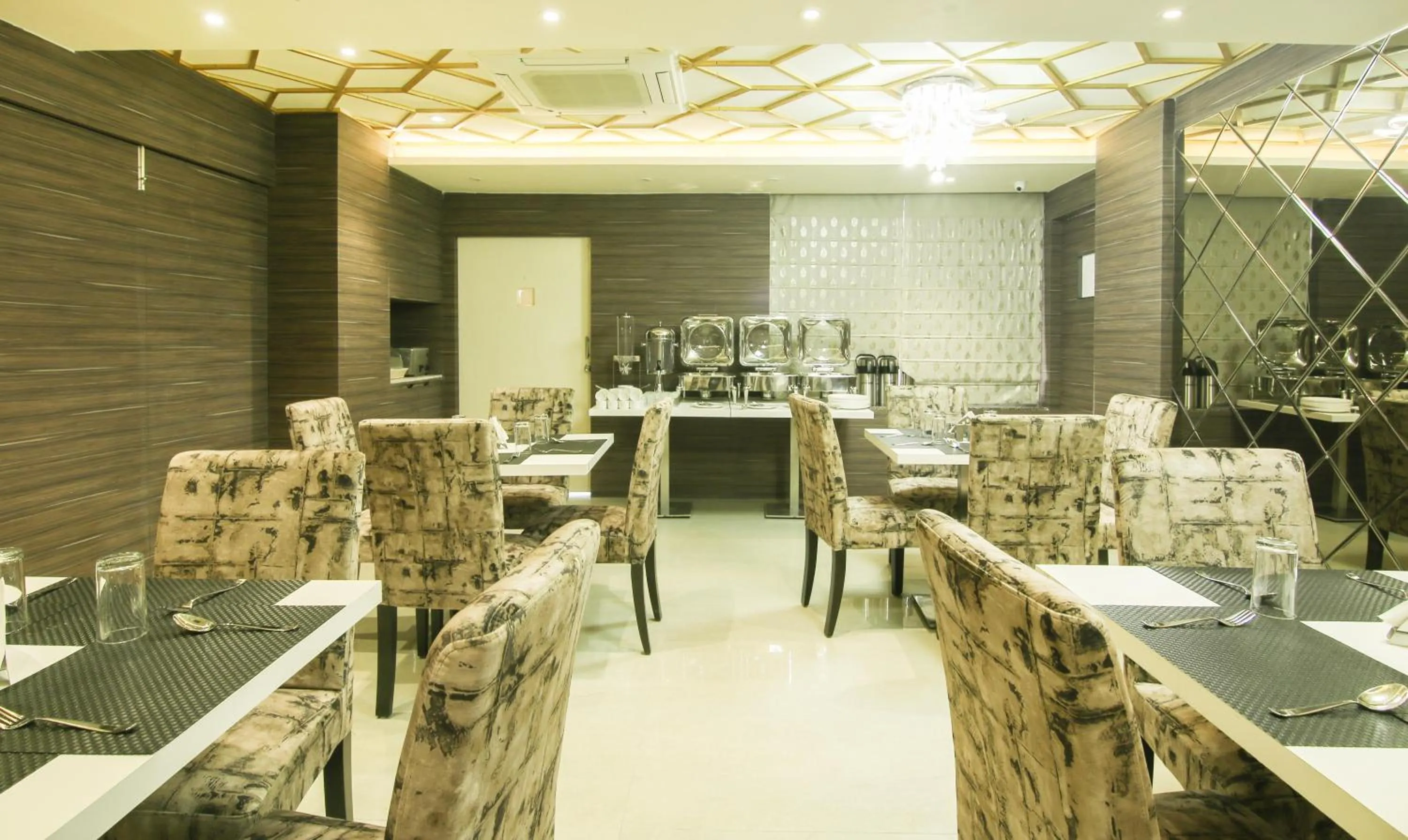 Dining area in Treebo Hoops - Airport, VIP Road