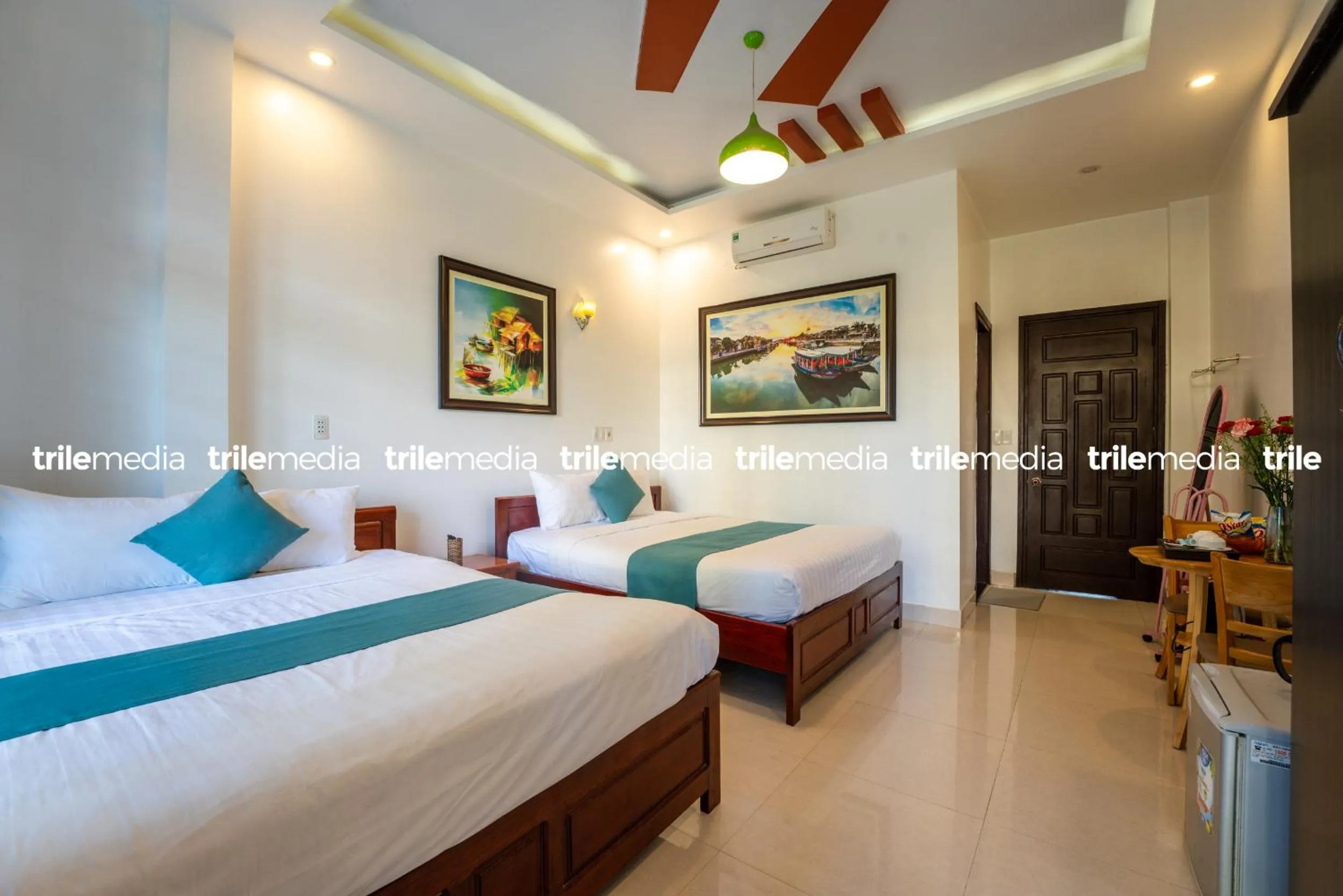 Bed in Rockmouse Centre River Villa Hoi An