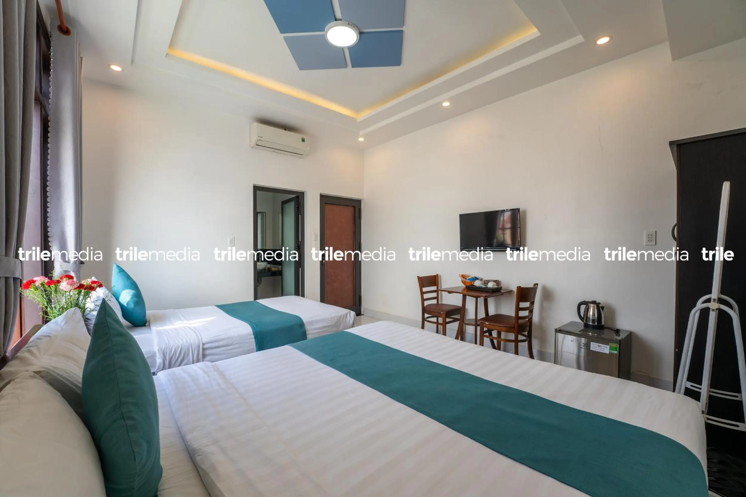 Communal lounge/ TV room, Bed in Rockmouse Centre River Villa Hoi An